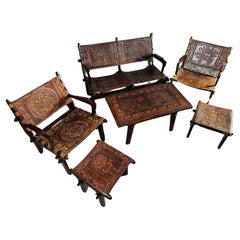 Ensemble brutaliste de fauteuil et tabouret de canapé en cuir mi-siècle par Angel Pazmino