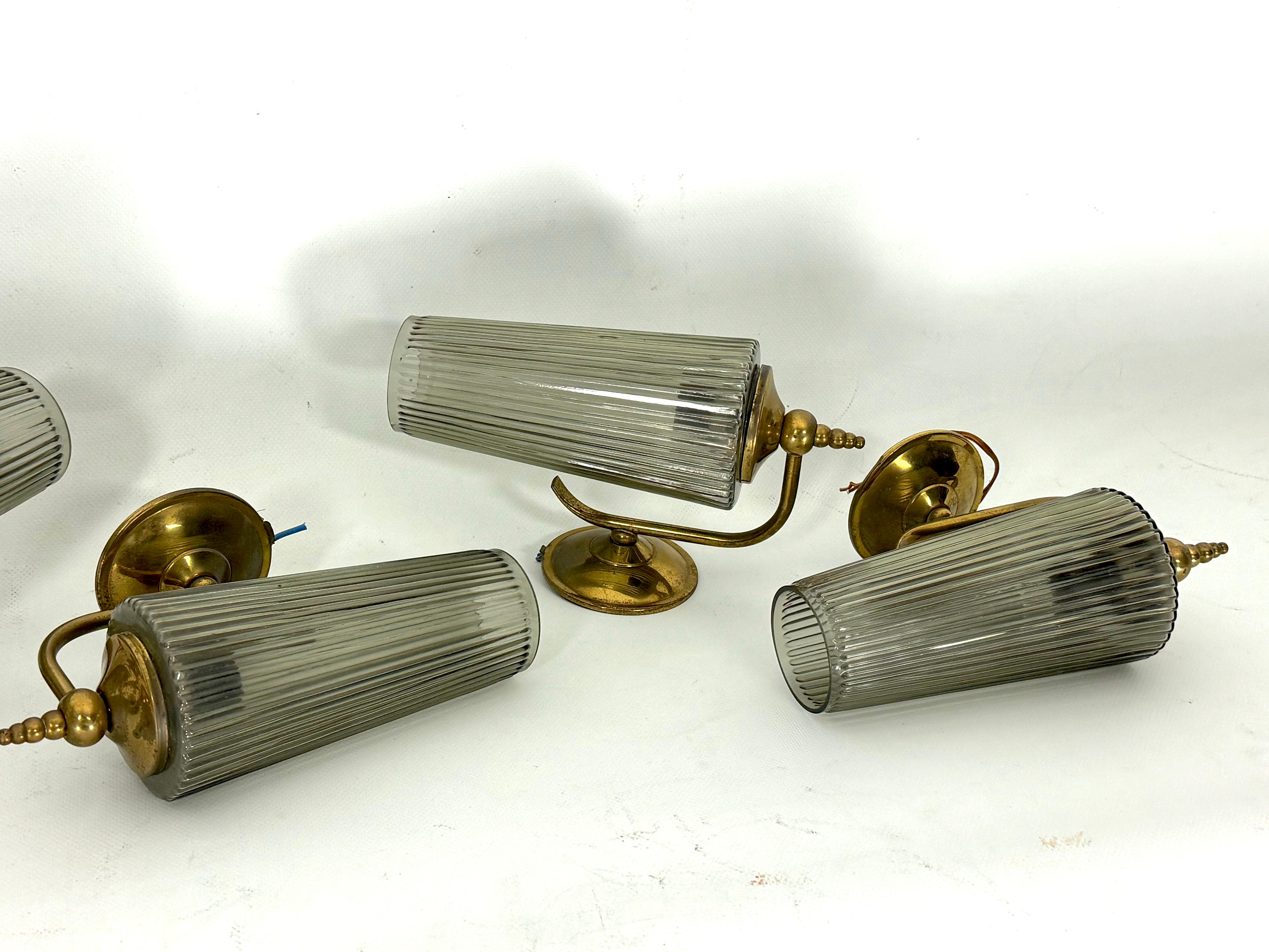 Italian Mid-Century Set of six sconces in brass and fume glass. Italy 1950s For Sale