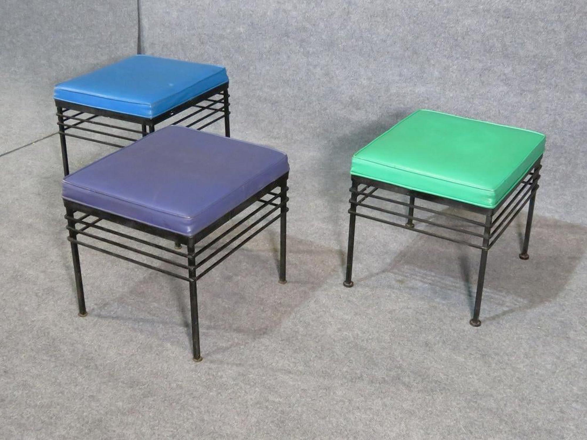 Vintage modern Paul McCobb style footstools with iron frames and thick colored cushions.
(Please confirm item location - NY or NJ - with dealer).
   