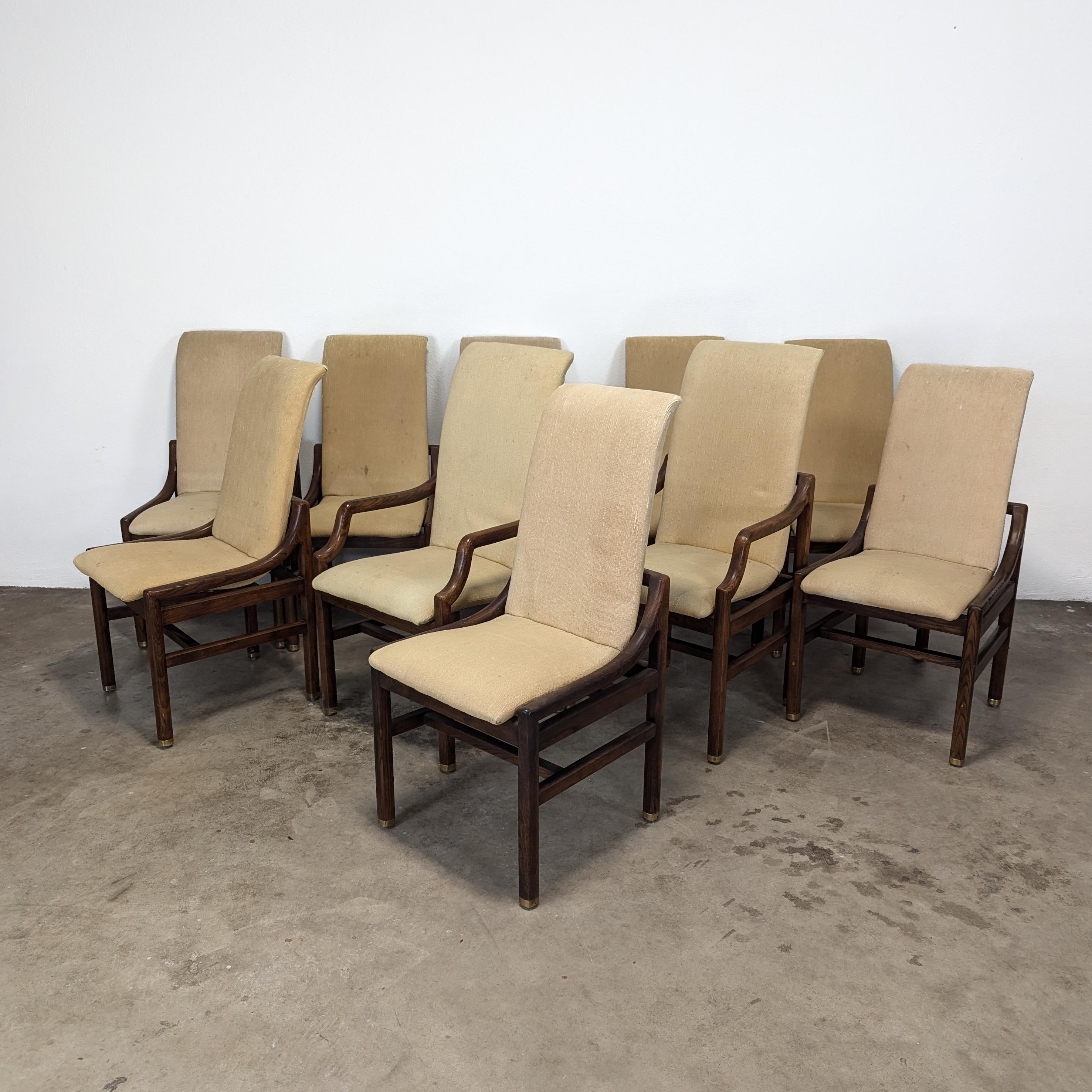 For sale is a stunning set of Mid-Century Modern sculptural dining chairs by the esteemed manufacturer Henredon. This exquisite collection includes two armchairs and eight side chairs, each boasting a distinctive floating frame design in its