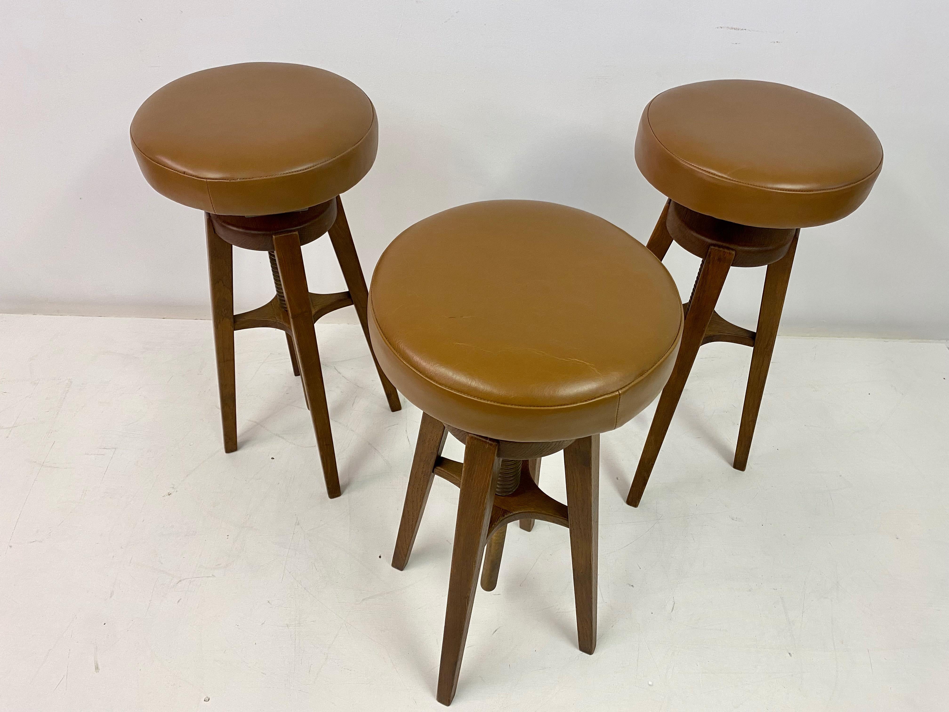 20th Century Mid Century Set of Three Danish Oak and Leather Stools