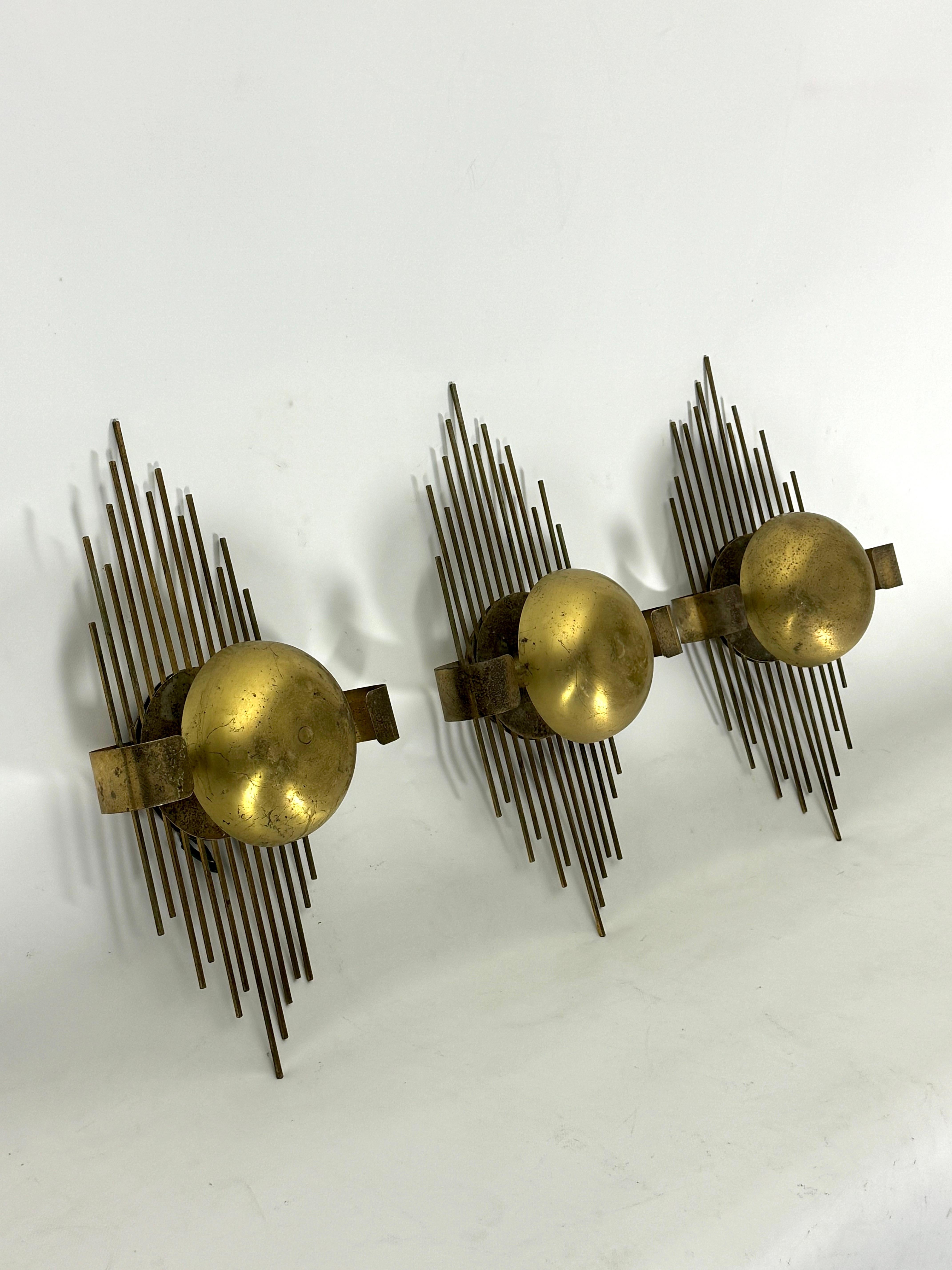 Italian Mid-Century Set of three gilded metal sconces. Italy 1950s For Sale