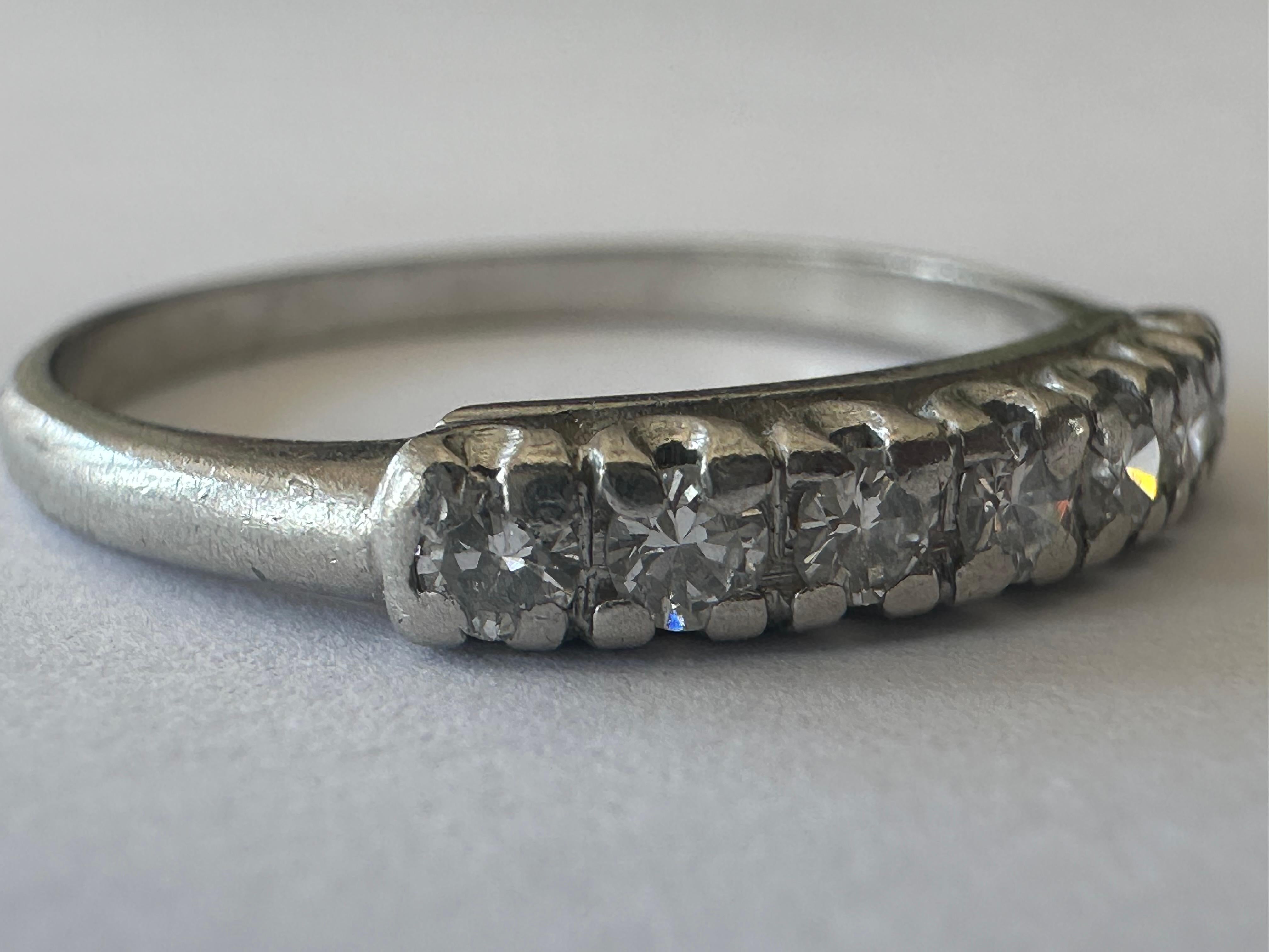 Women's Mid-Century Seven Stone Diamond and Platinum Band  For Sale