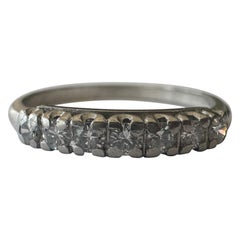 Bandeau en platine et diamant à sept pierres du milieu du siècle dernier