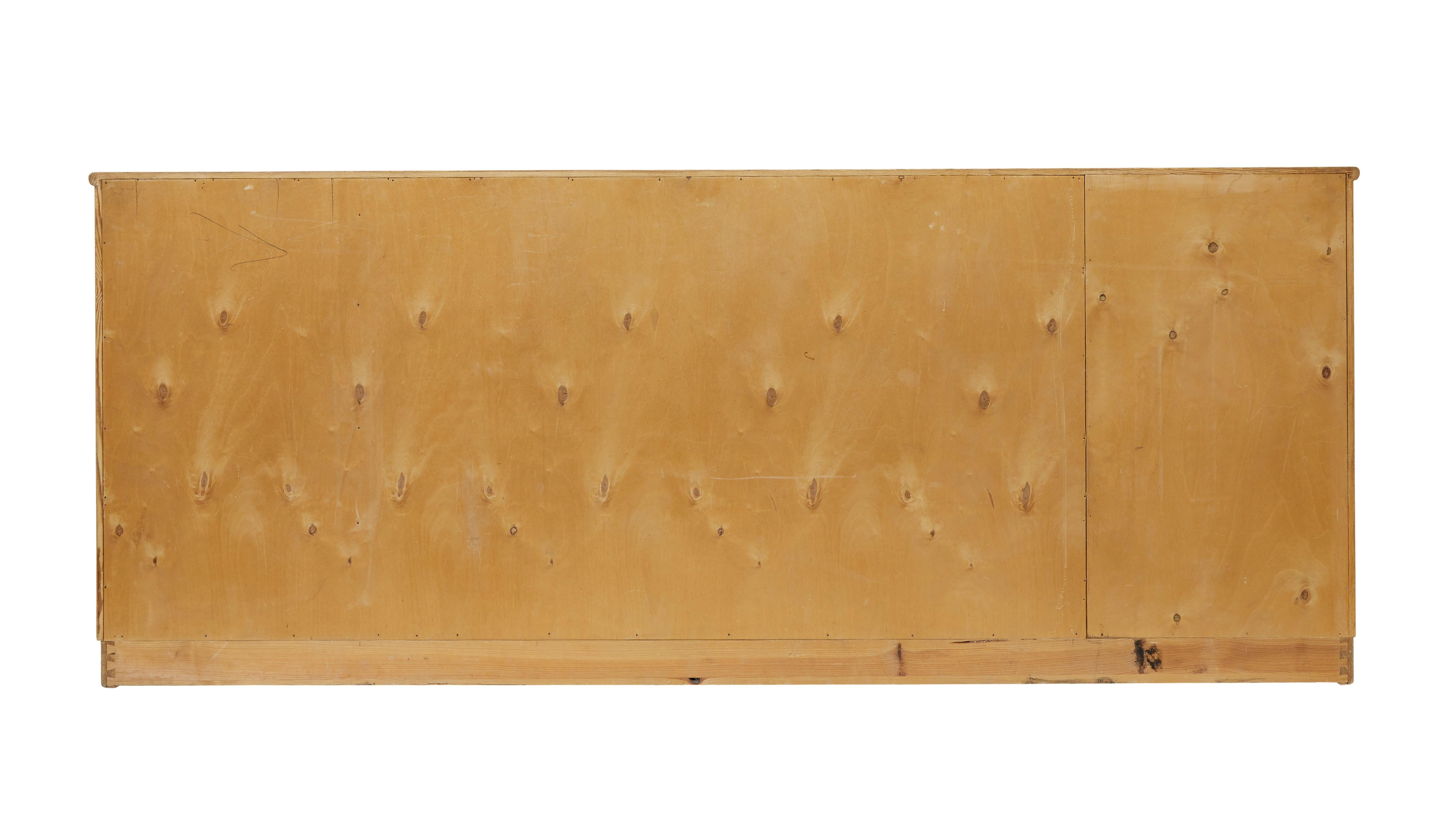Hand-Crafted Mid century shaped Scandinavian elm low open bookcase For Sale