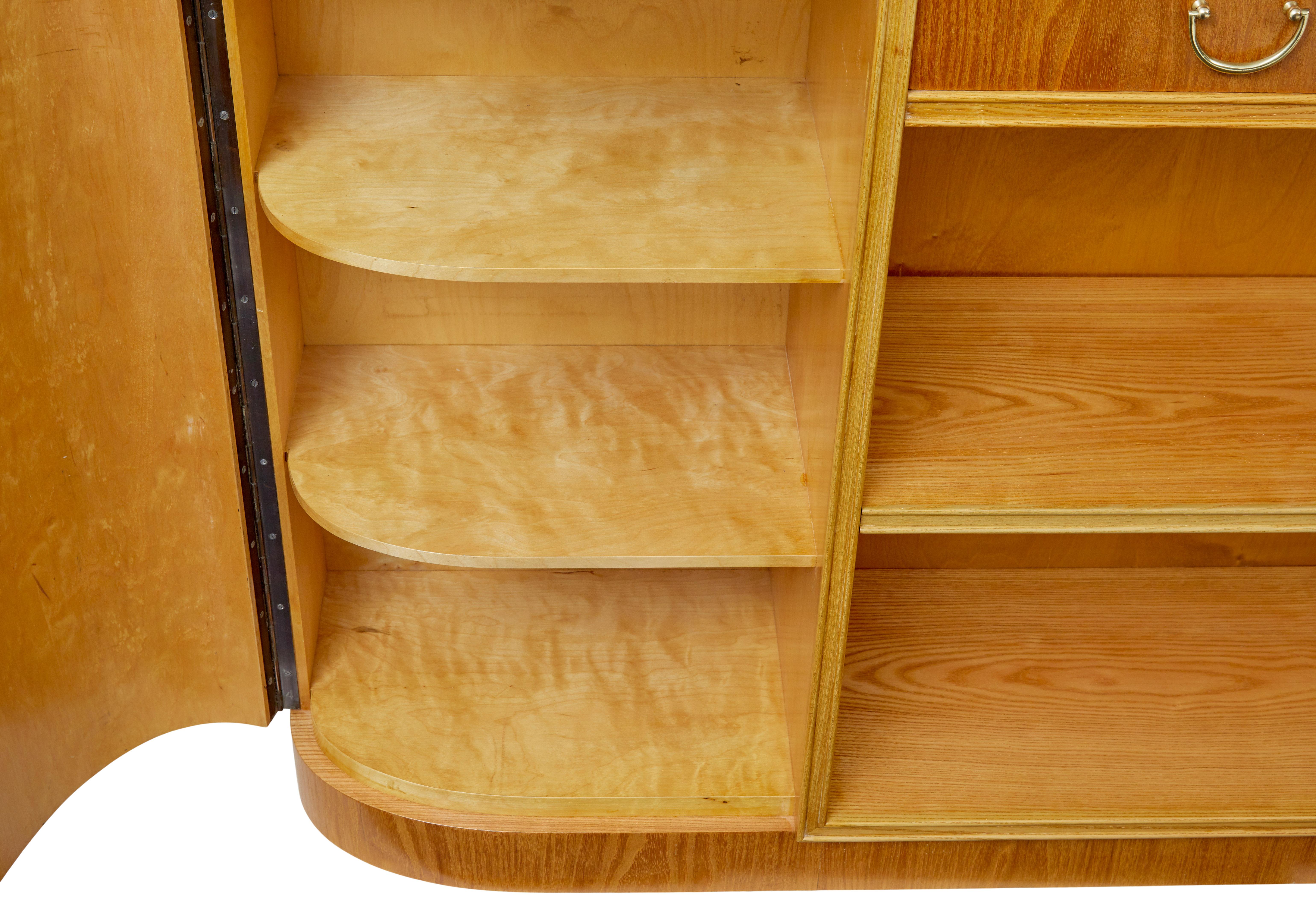 Birch Mid century shaped Scandinavian elm low open bookcase For Sale
