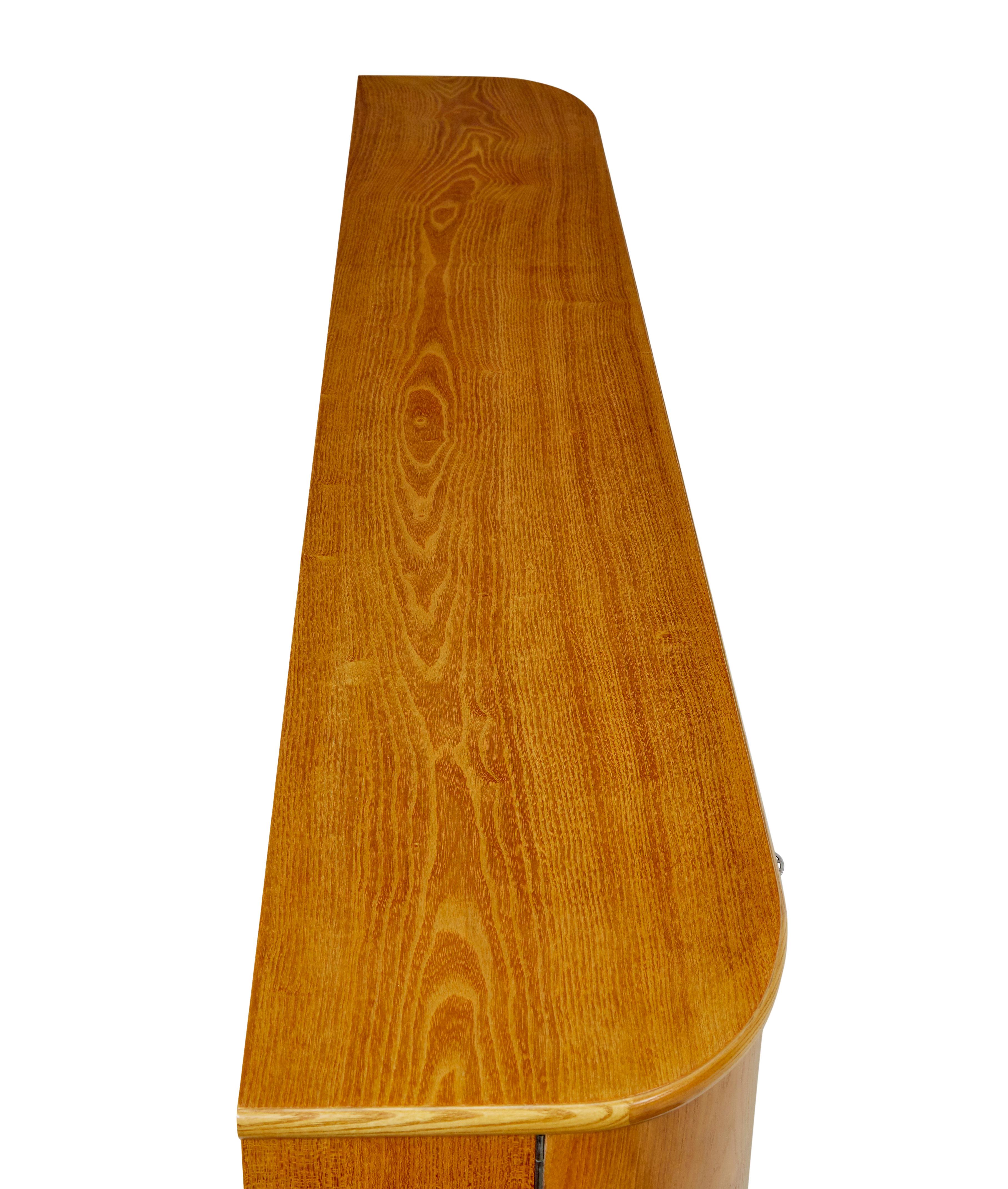 Mid century shaped Scandinavian elm low open bookcase For Sale 1