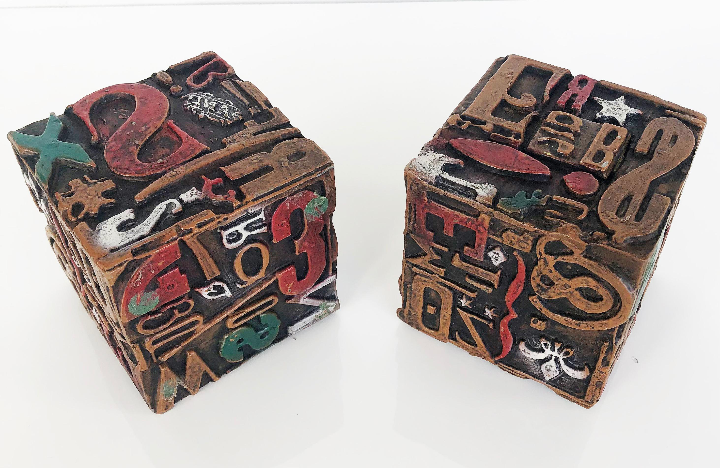 Mid-century Sheldon Rose AlphaSculpt Typesetter Blocks, Vanguard Studios 1960s

Offered for sale is a pair of mid-century modern sculptures manufactured by Vanguard Studios and designed by Sheldon Rose. These decorative blocks contain type