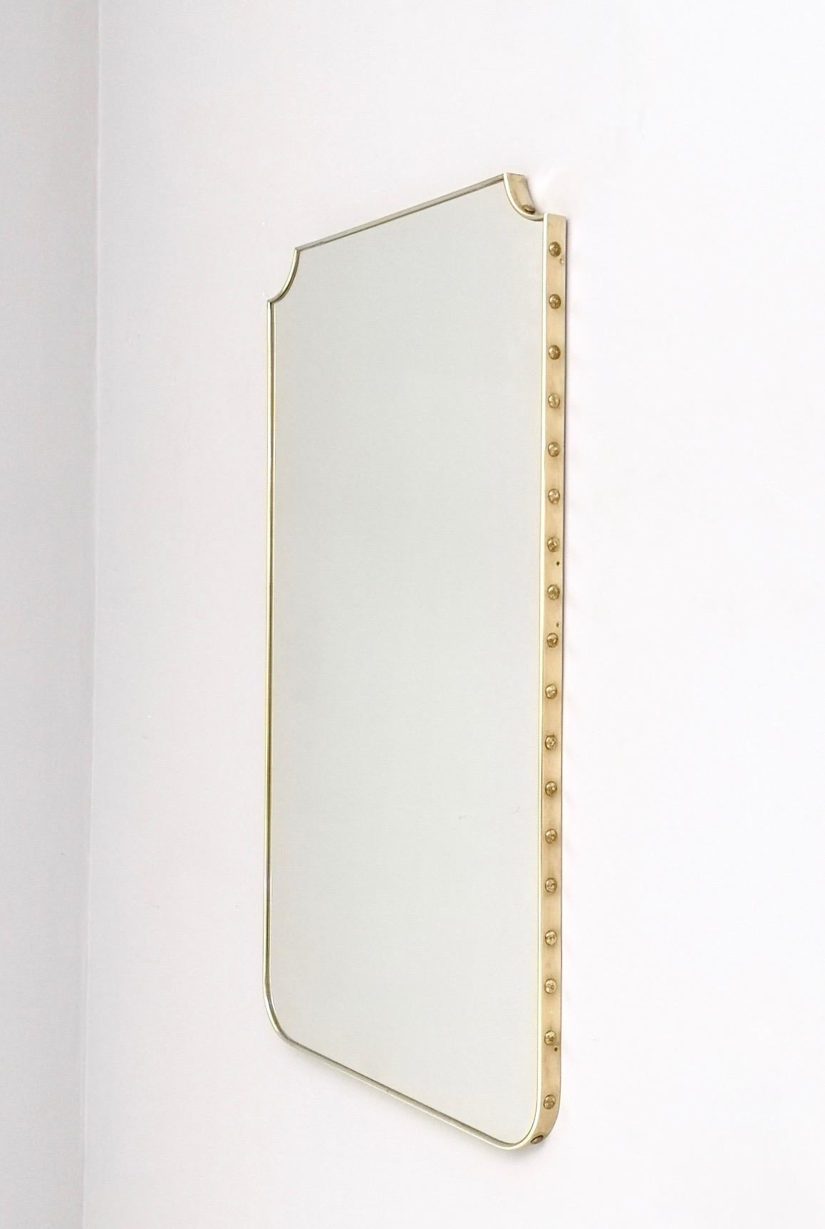 Mid-Century Modern Mid-century Shield Shaped Wall Mirror with a Brass Studded Frame, Italy, 1960s