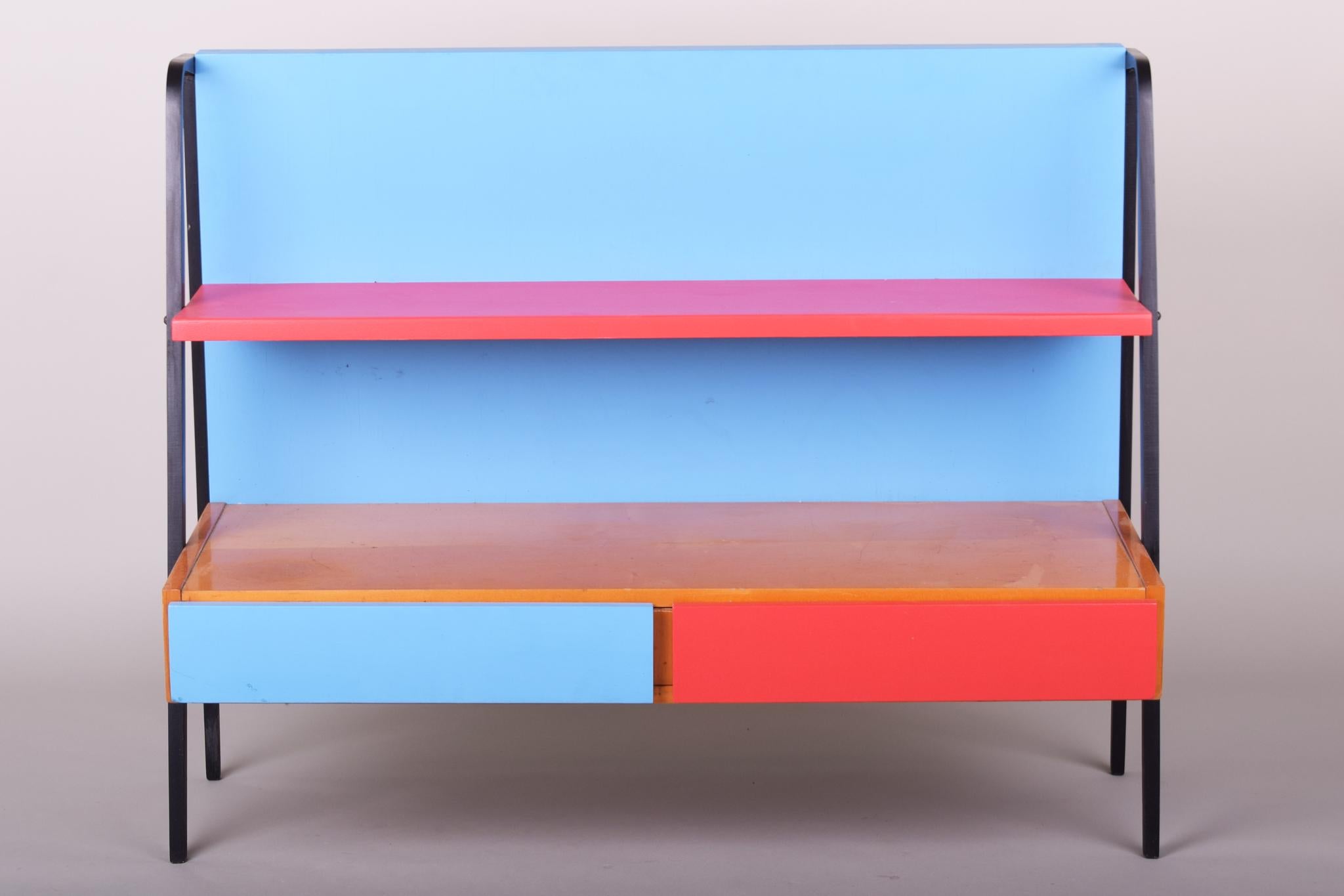 Shoe stand made out of beech in Czechia, 1950s. With wild colours that are sure to stand out in any context.