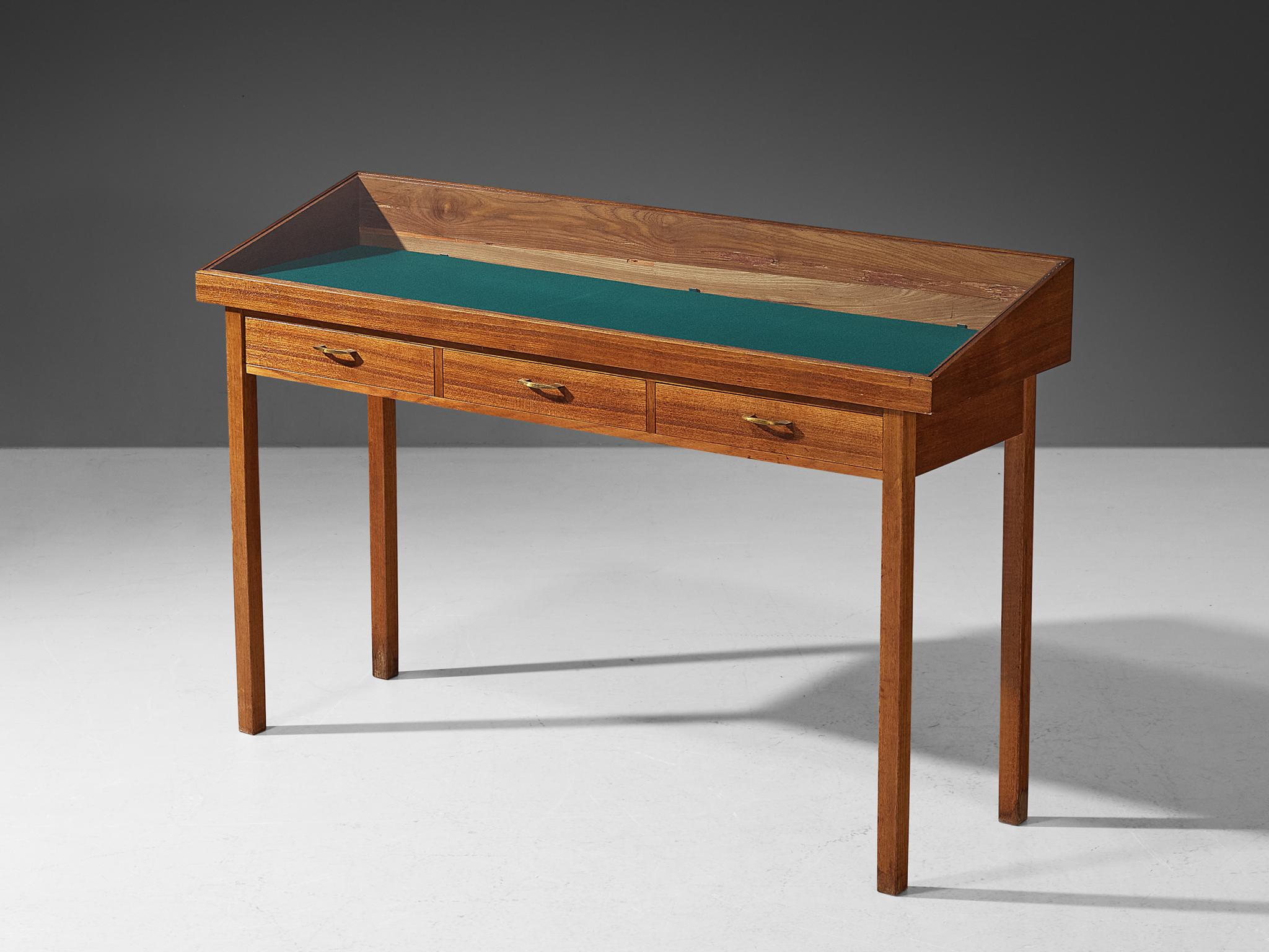 Showcase, walnut veneer, pine, felt, glass, brass, Europe, 1960s. 

This elegant showcase is executed in pine and finished with a warm walnut veneer. Its oblique glass top makes sure that your special belongings are well displayed. Striking green