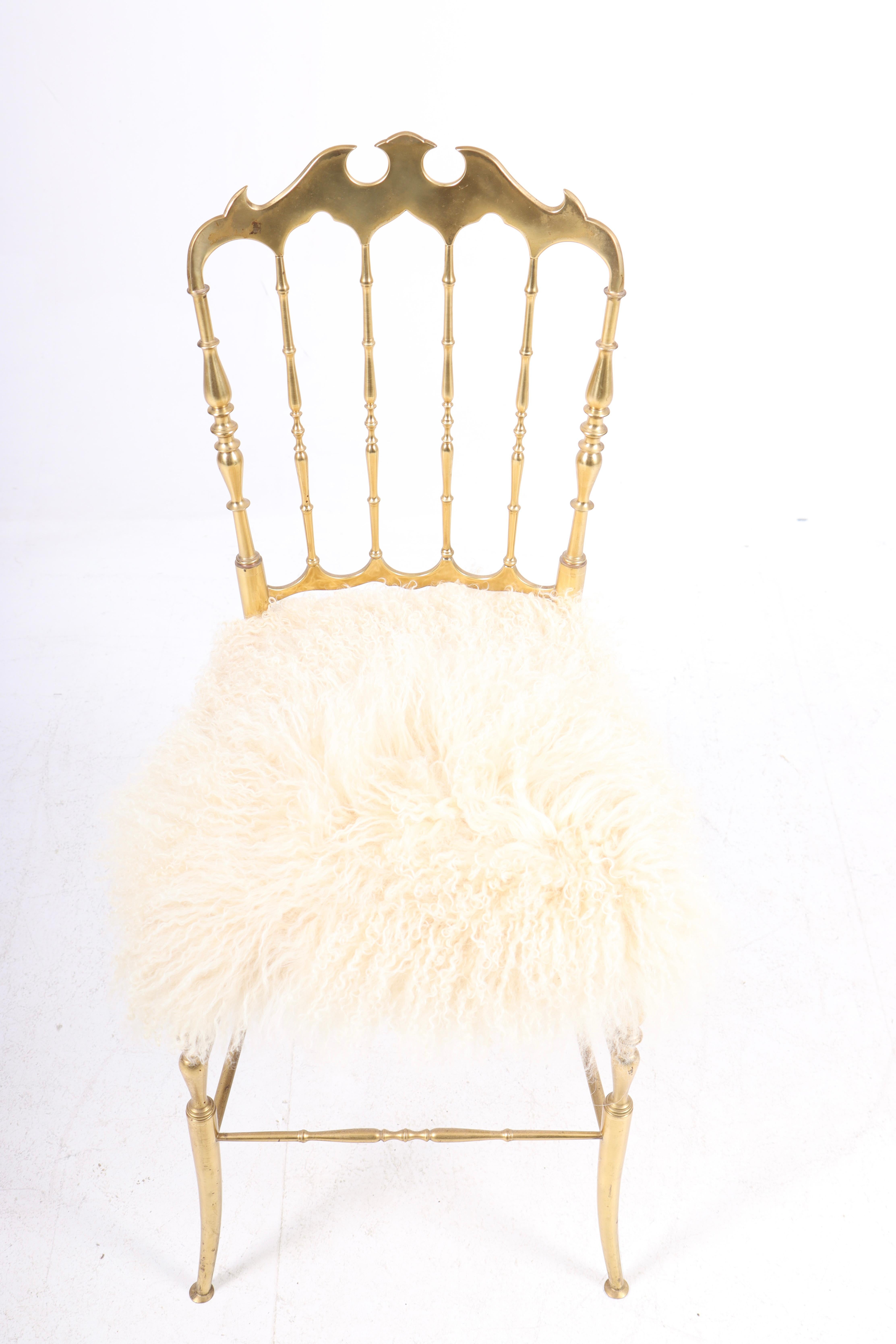Side chair in brass and sheepskin. Designed and made in Italy. Great original condition.