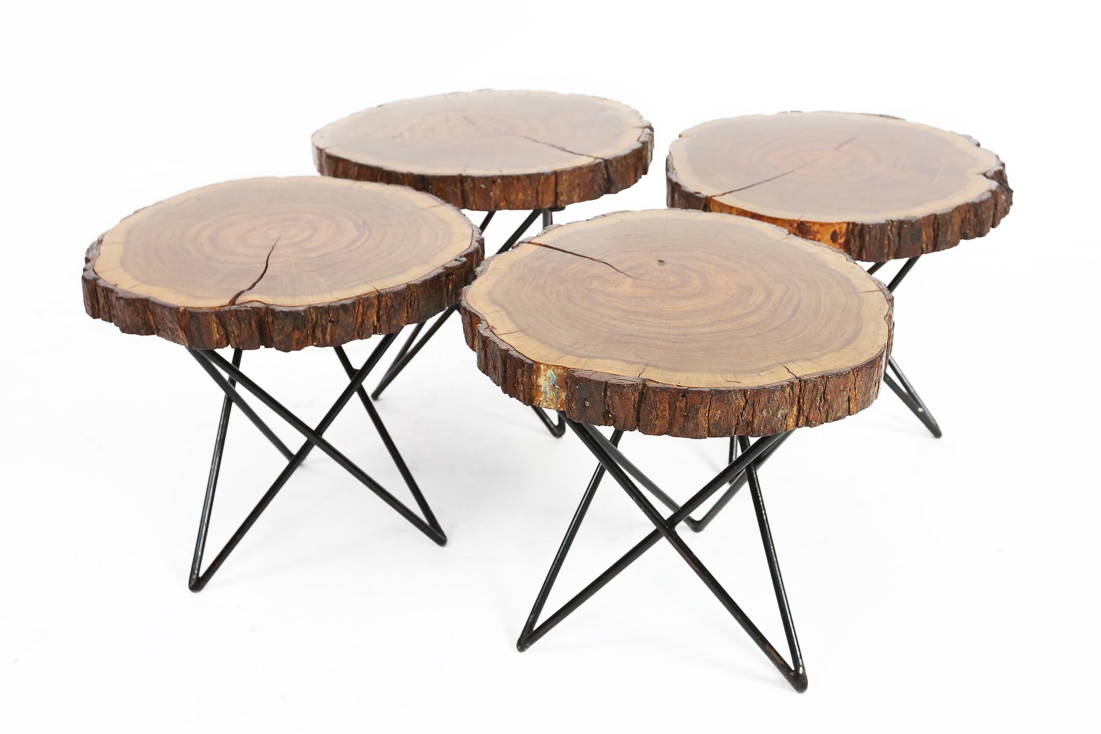 Side tables with original 1950s metal hairpin legs, probably in magnolia wood
4 pieces available, diameter of the wood varies between 35 and 40 cm diameter.