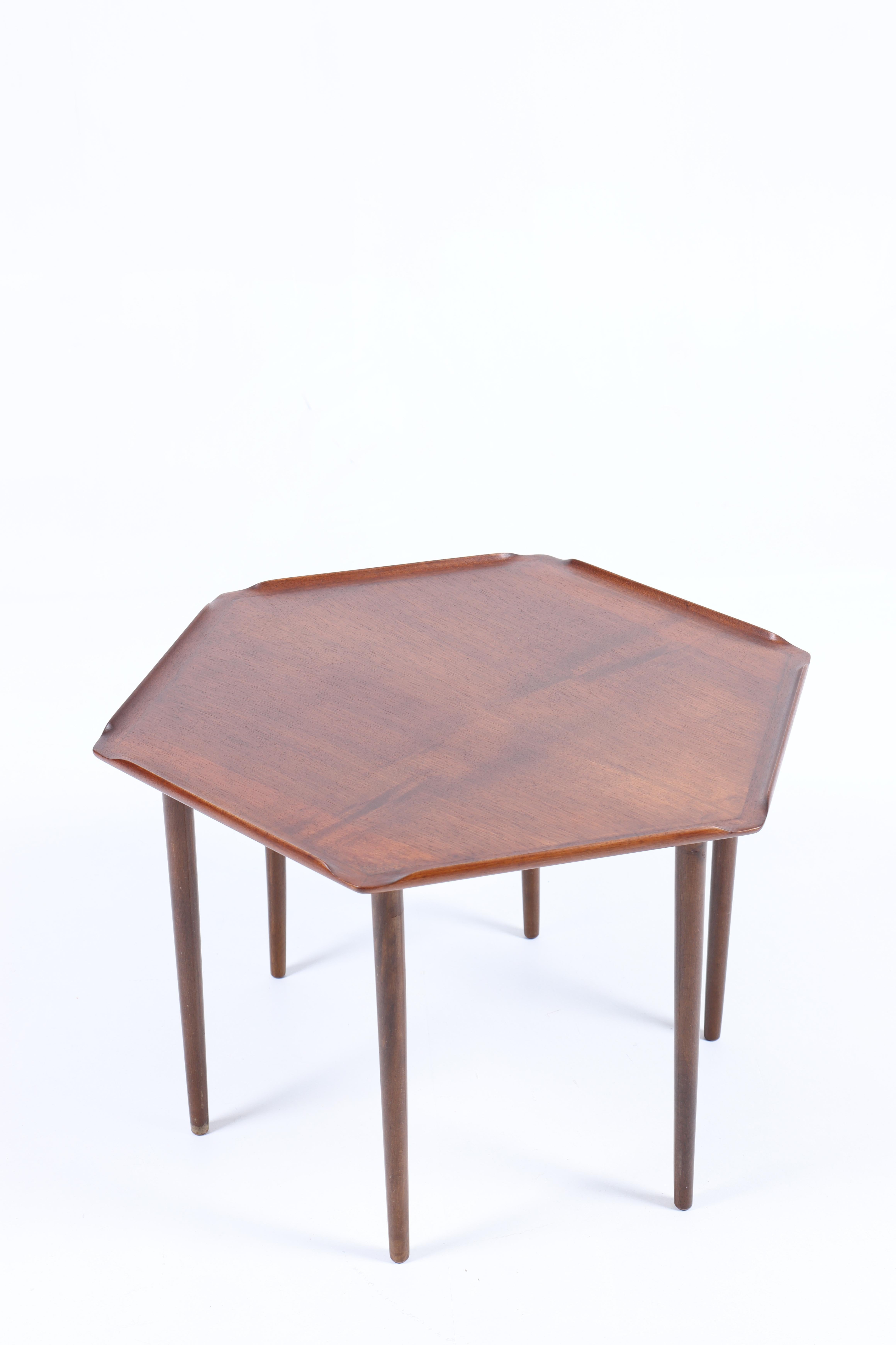 Side table in walnut, designed and made in Denmark. Great original condition.