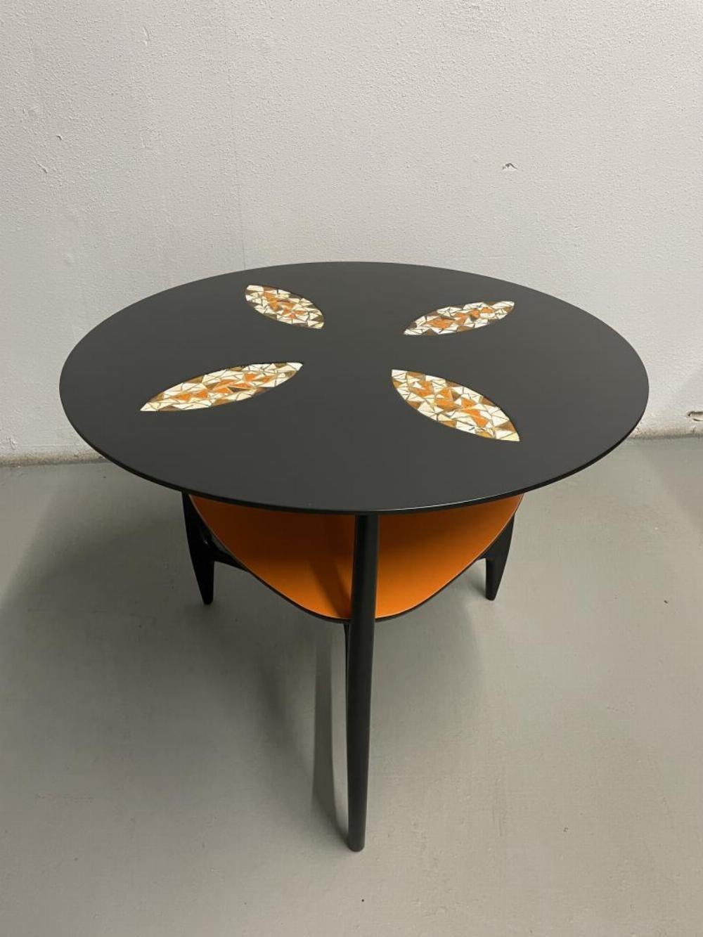 Mid Century side table with Vintage Hand Painted Tile Inset. Ebonized wood and orange Lacquer. 1960's.