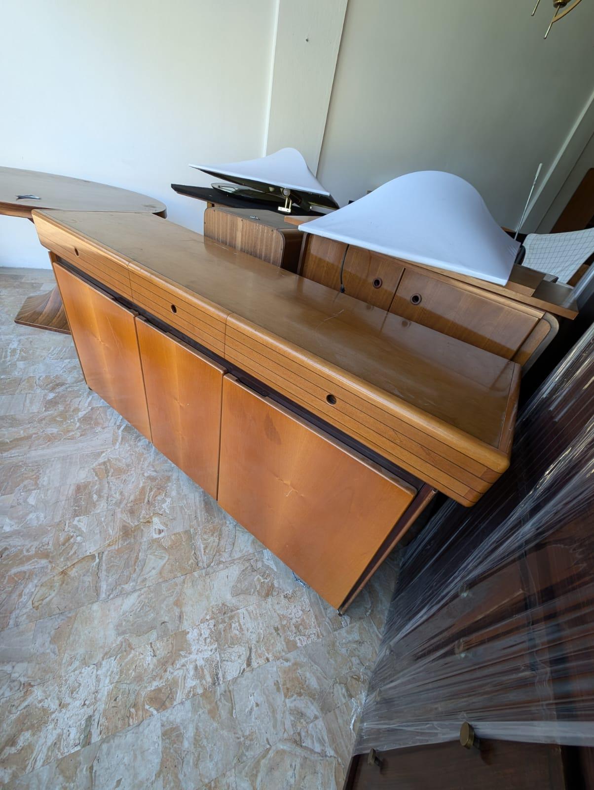 Step into the realm of Mid-Century elegance with this stunning Sideboard, tastefully designed in the style of Maxalto, a renowned Italian furniture brand. This rare vintage piece from the 1970s is a remarkable testament to the unparalleled