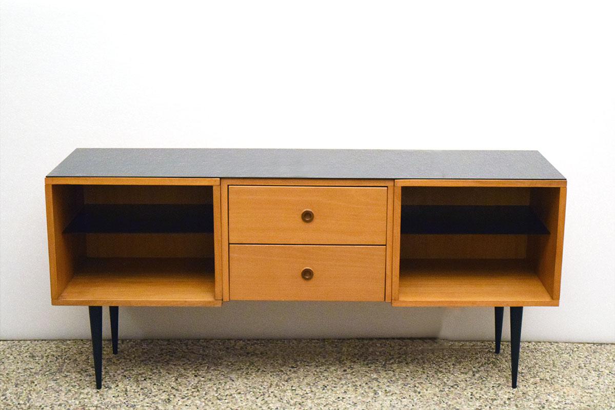 Sideboard in ash wood and black glass, 1950's Italian production.
With two shelves and top in black, two drawers and conical feet in black painted wood.
Available on the website its coordinated cupboard.
In excellent condition.