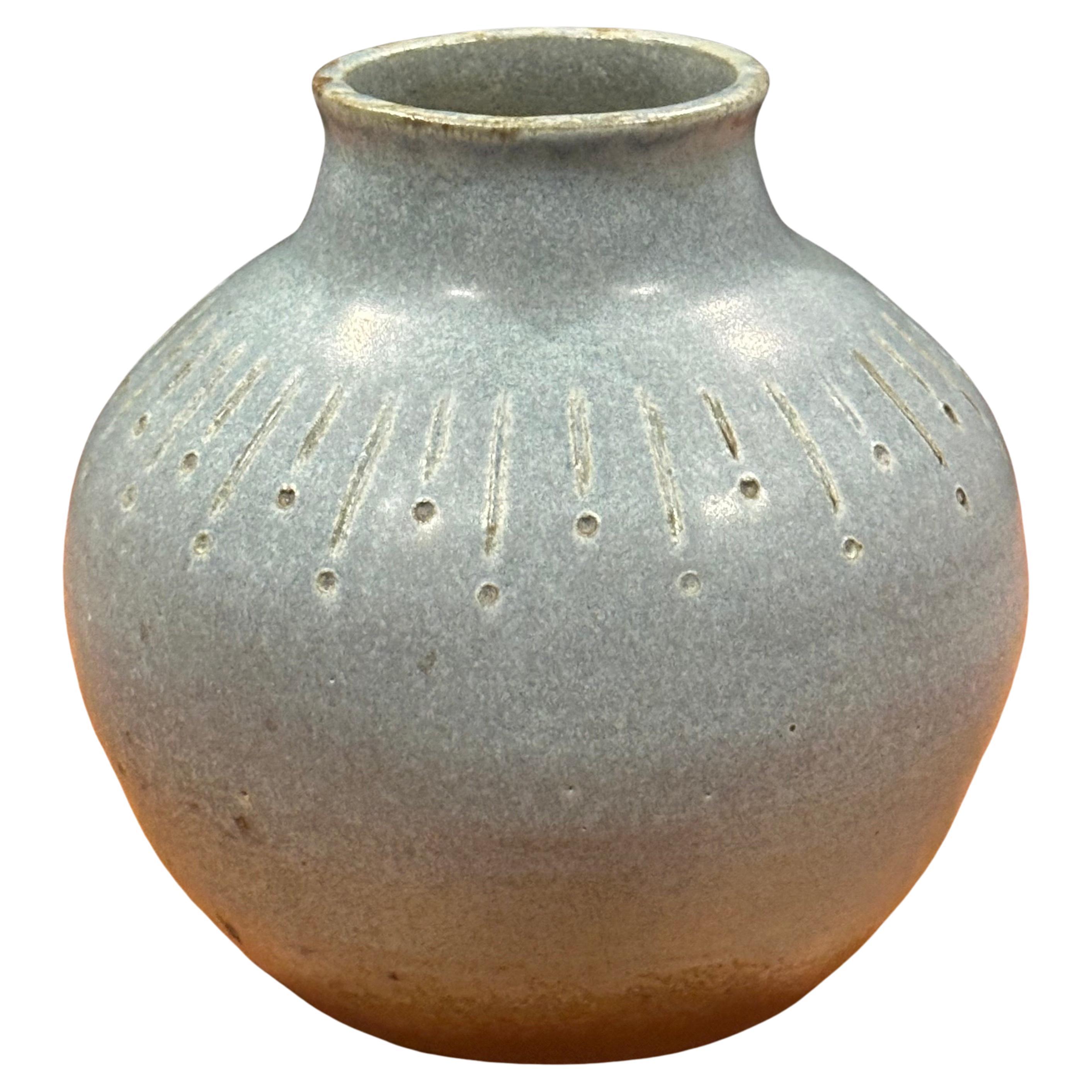 Mid-Century signed California studio pottery vase, circa 1967. The vase is in very good vintage with no chips or cracks and measures 5.75
