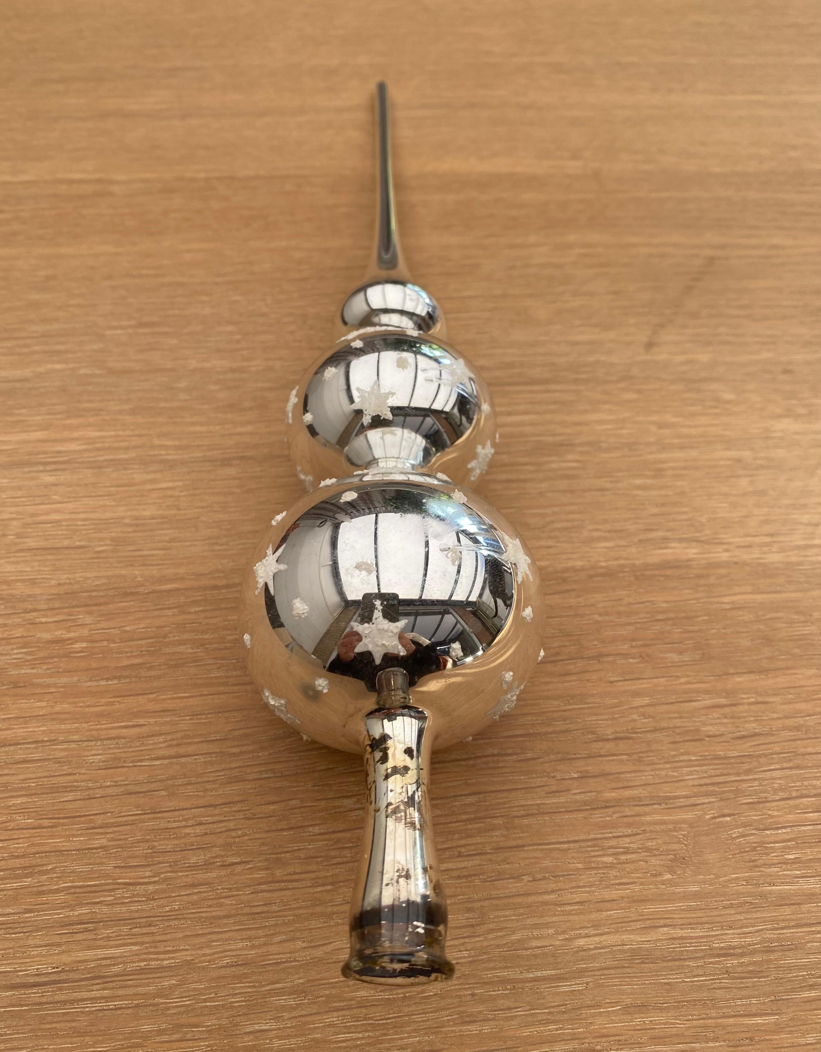 Beautiful blown Christmas tree topper, decorated with stars and dots. Very nice piece with small traces of age and use.