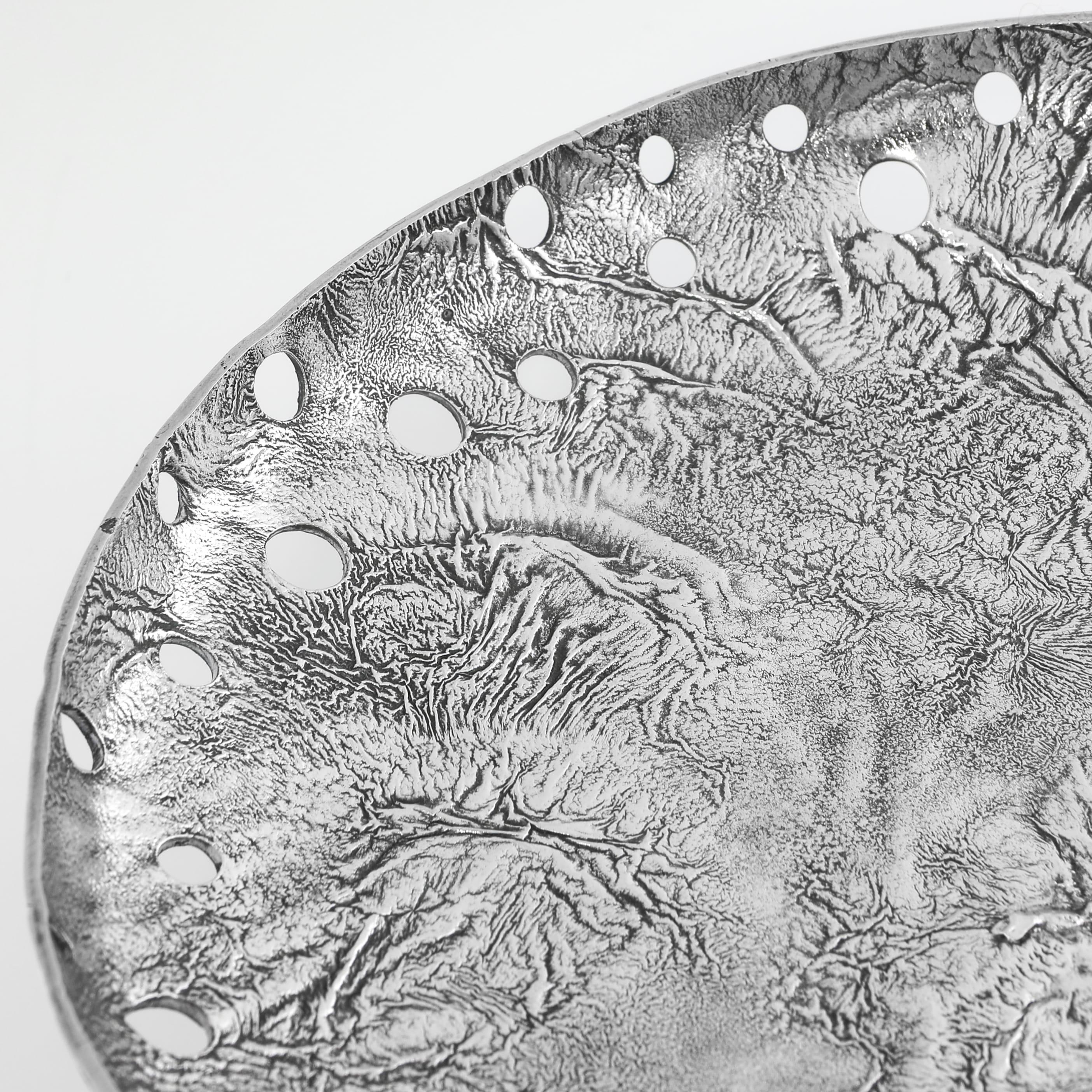 English Mid century silver dish made in London in 1970 using the Samorodok technique