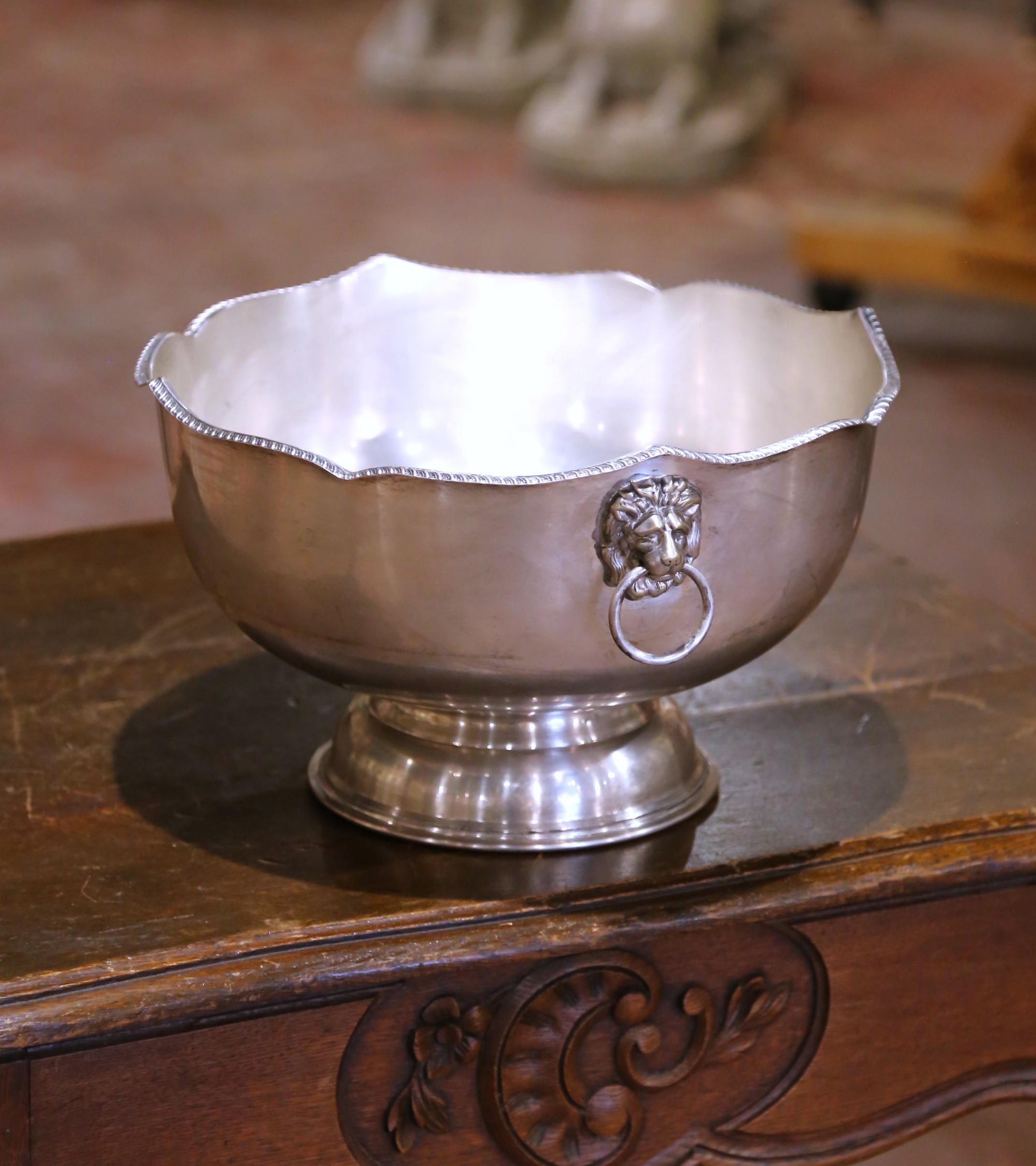 Chill your favorite Sauvignon Blanc or Veuve Clicquot in style in this elegant antique cooler bucket!
This striking mid-century champagne bucket blends classical elegance with robust construction. Measuring 13 inches in diameter and 8 inches high,