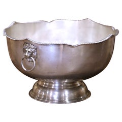 Cubo de champán festoneado de plata sobre cobre de mediados de siglo con asas de máscara de león