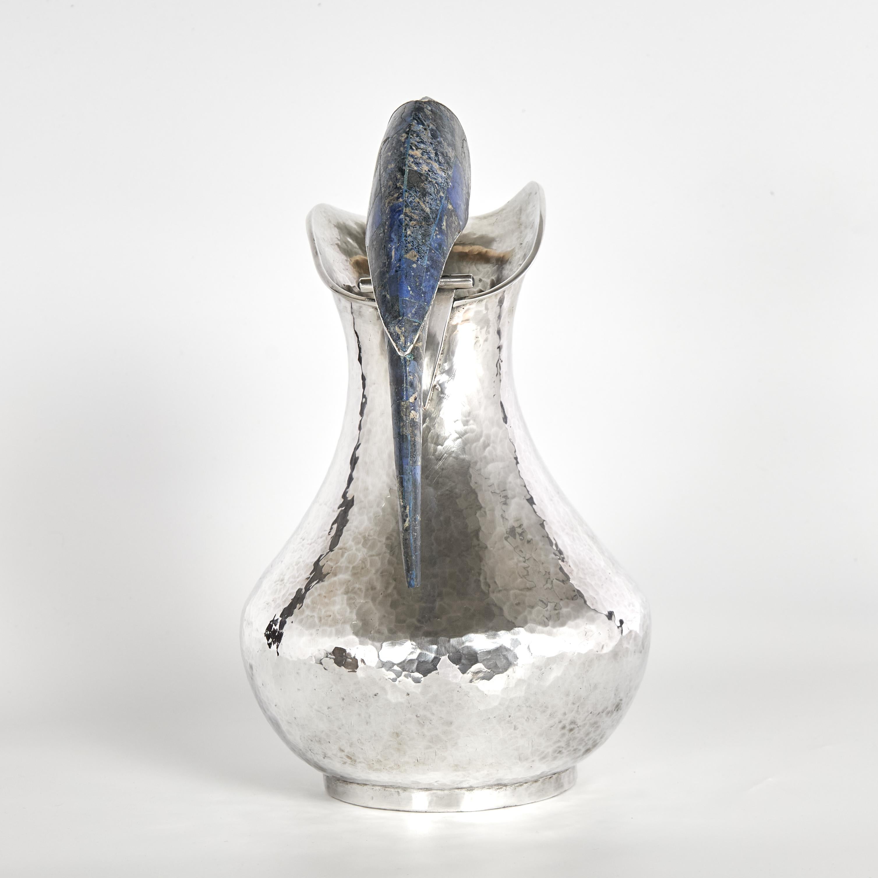 Hammered Mid Century Silver Plate Pitcher with Bird Handle by Los Castillo For Sale