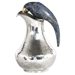Jarra de plata de mediados de siglo con asa de pájaro de Los Castillo