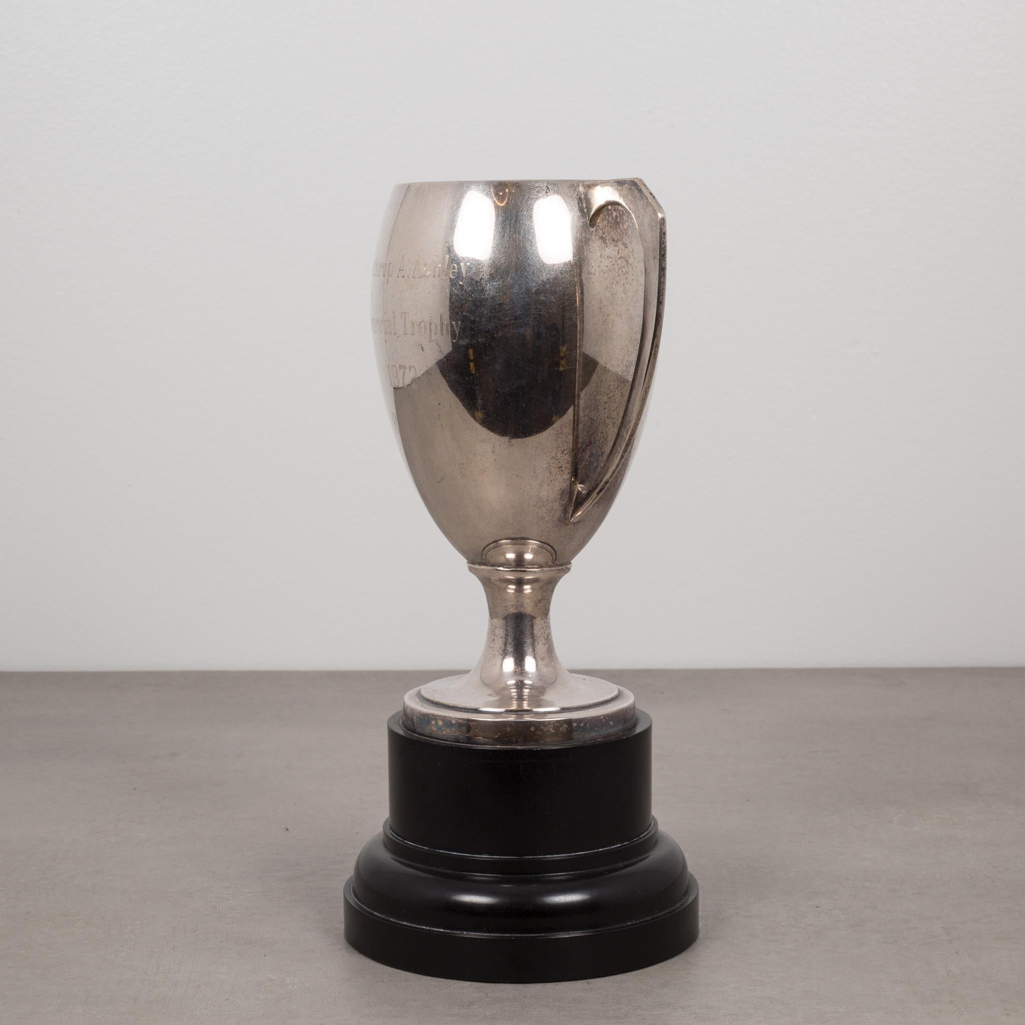 ABOUT

This is an original Mid-century trophy. The cup is silver plated with a black base. The cup is inscribed 