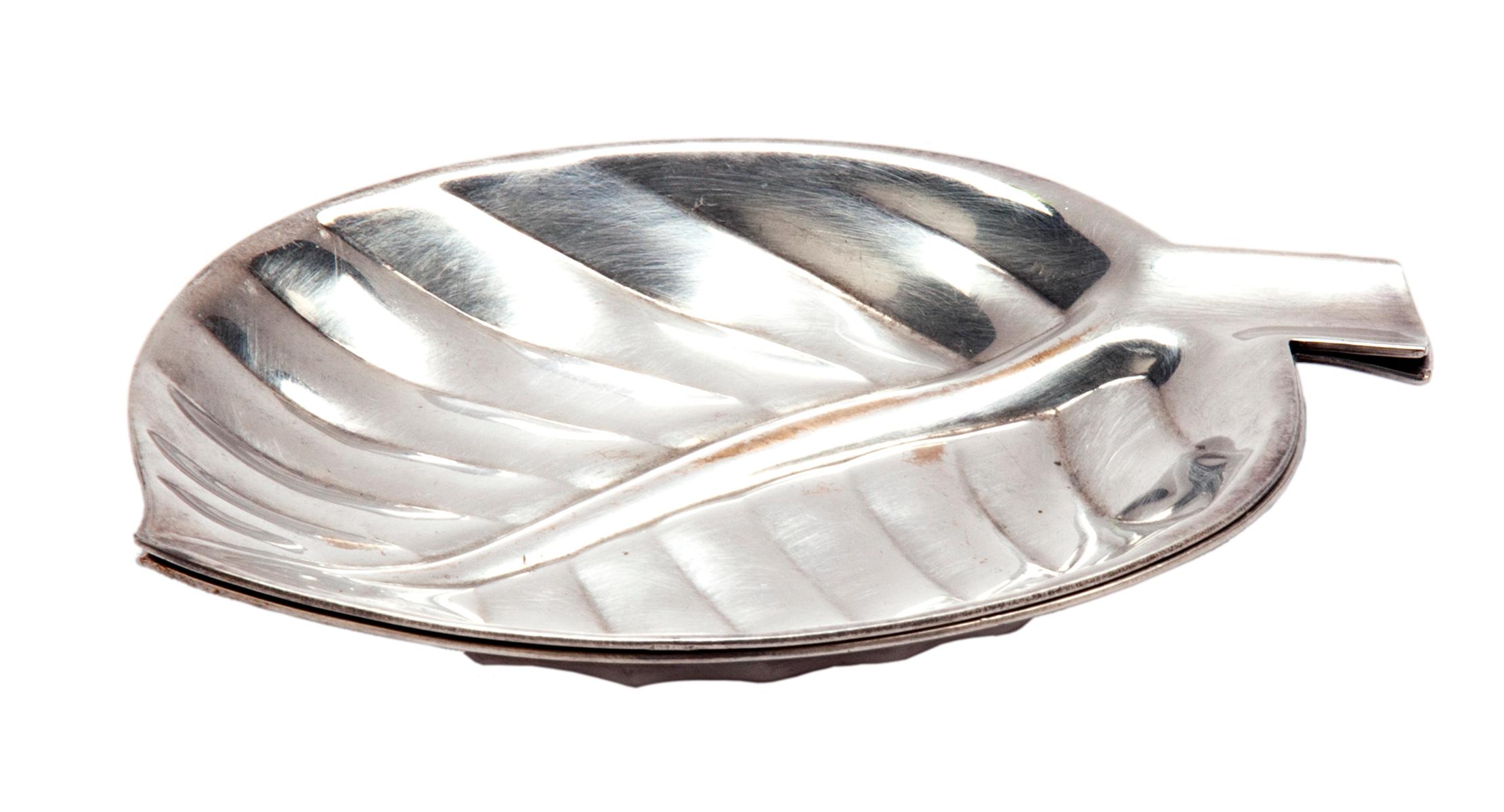 Mid Century Silver plate leaf trays, hallmark by International Silver on the underside. There is a peek of smooth brass peeking through the silver finish on 1 of the trays. By International Silver.