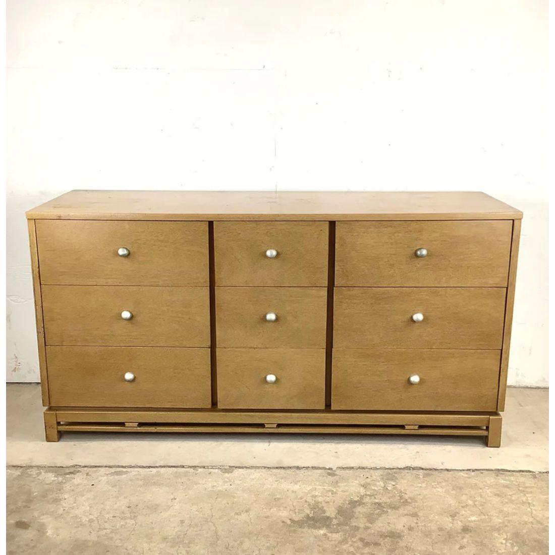 Enhance your living space with the timeless sophistication of this midcentury Simplex Dresser by Kent Coffey with Mirror. Crafted with the utmost care and attention to detail, this midcentury dresser embodies a perfect blend of style and