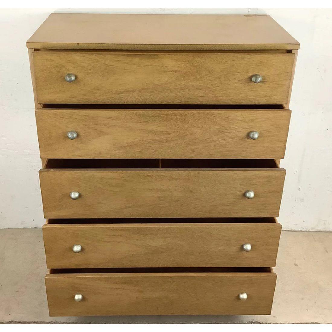 This unique vintage highboy dresser from 