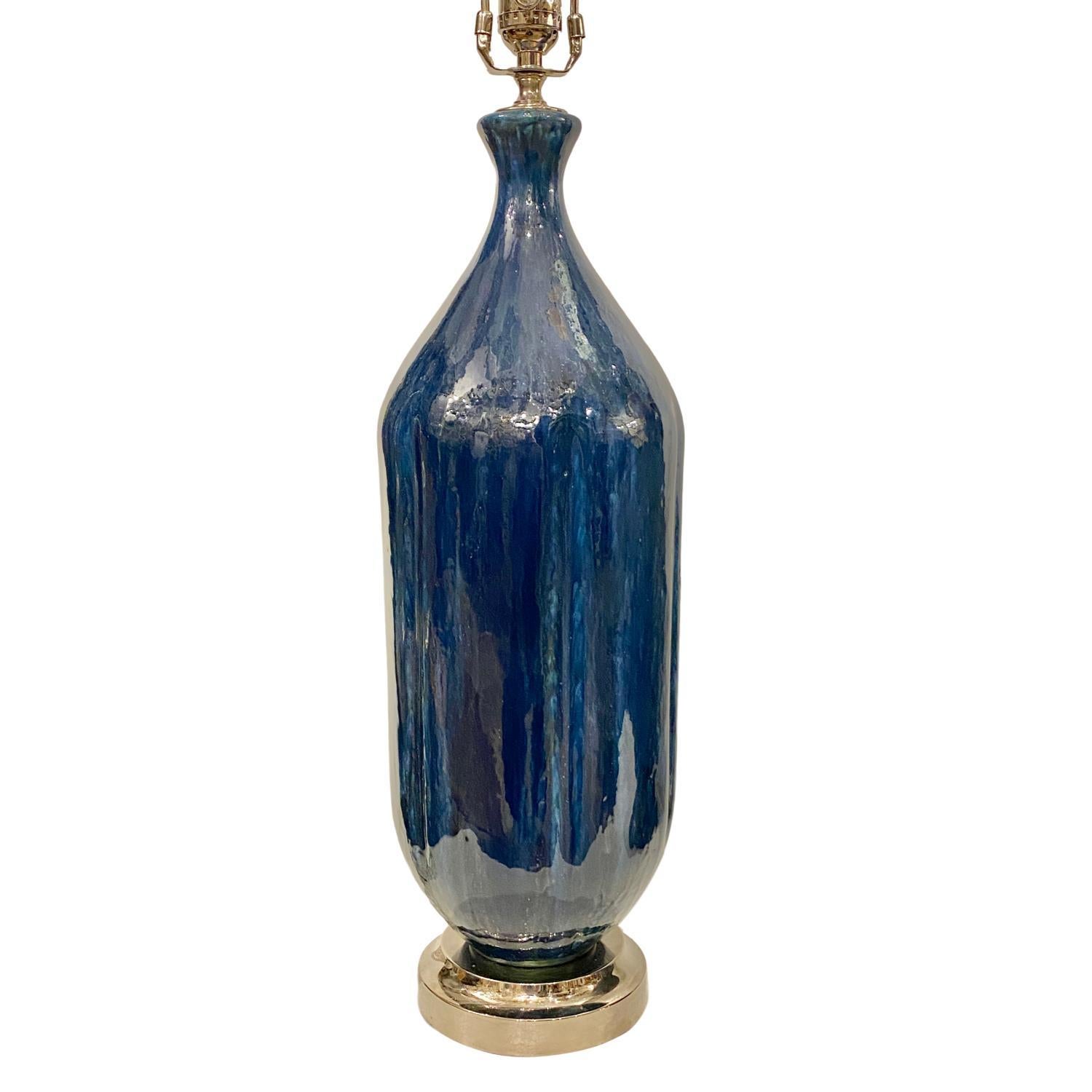 A single circa 1960s Italian blue glazed porcelain table lamp.

Measurements:
Height of body 22