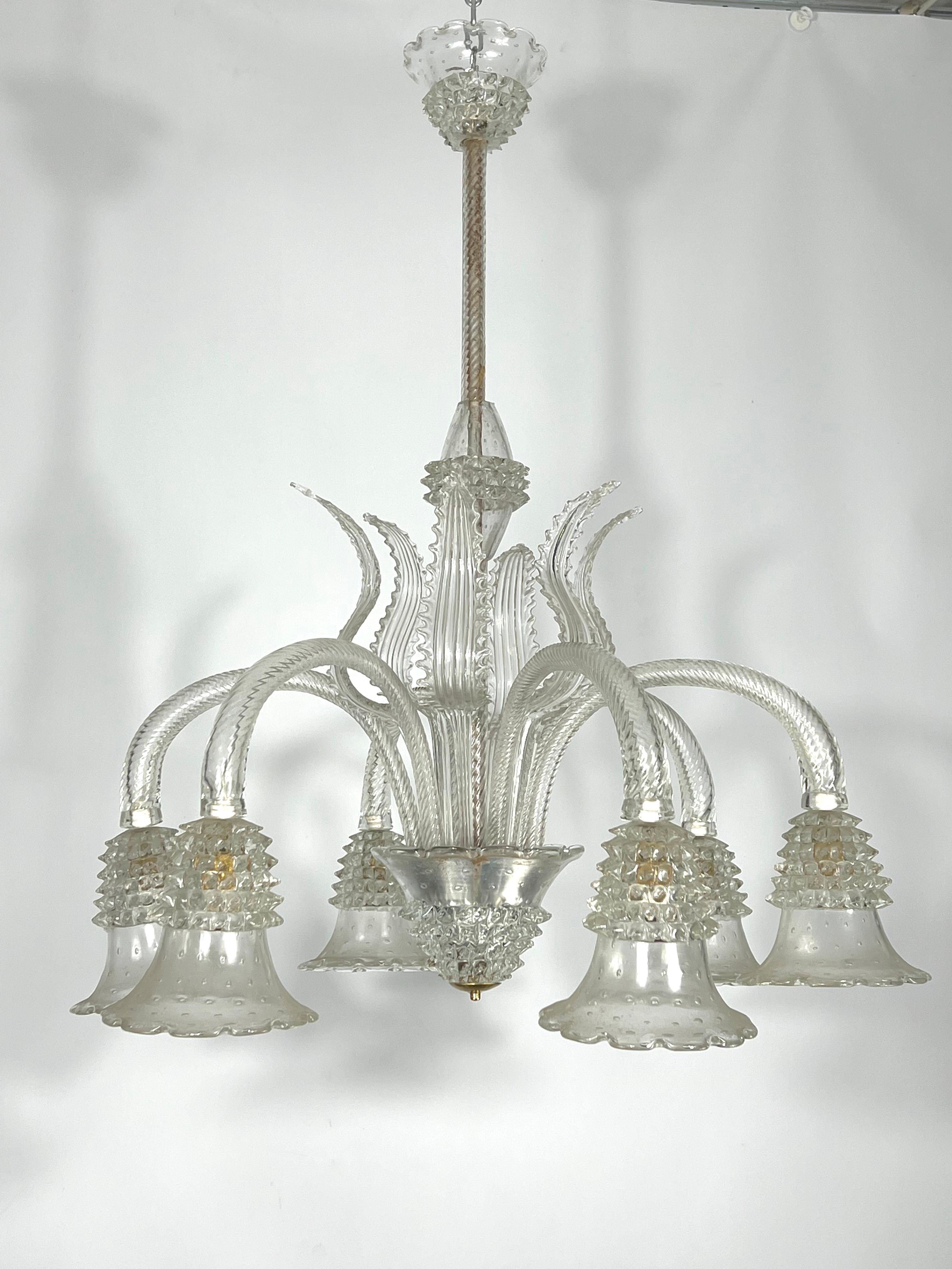Great vintage condition with normal trace of age and use for this six arms chandelier produced by Ercole Barovier during the 30s and made from bullicante rostrato murano glass. No chips or cracks. Full working with EU standard, adaptable on demand