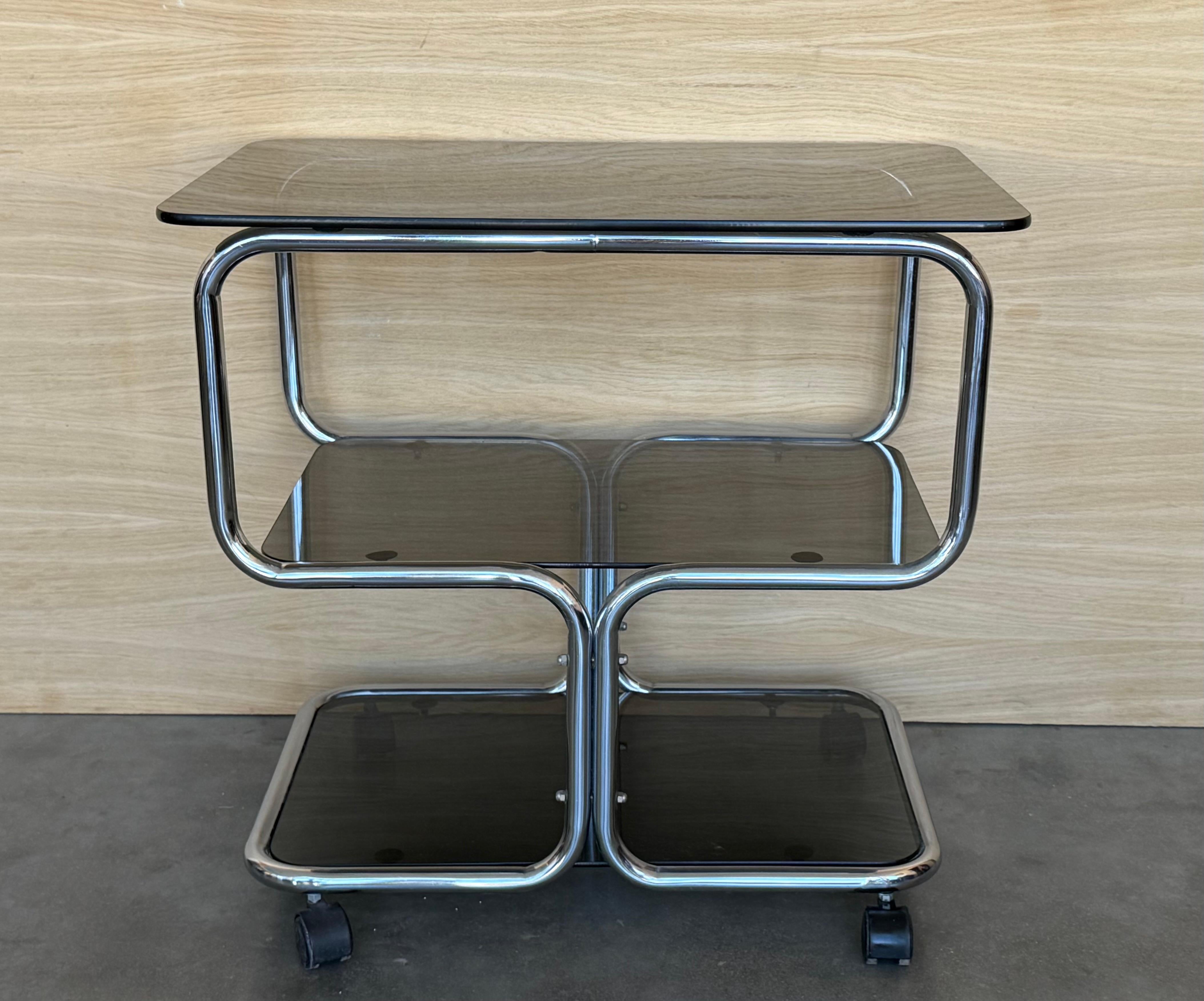 A Mid Century Sleek Chrome and Glass Drinks Trolley with Tiers On Castors Italian 1970's  