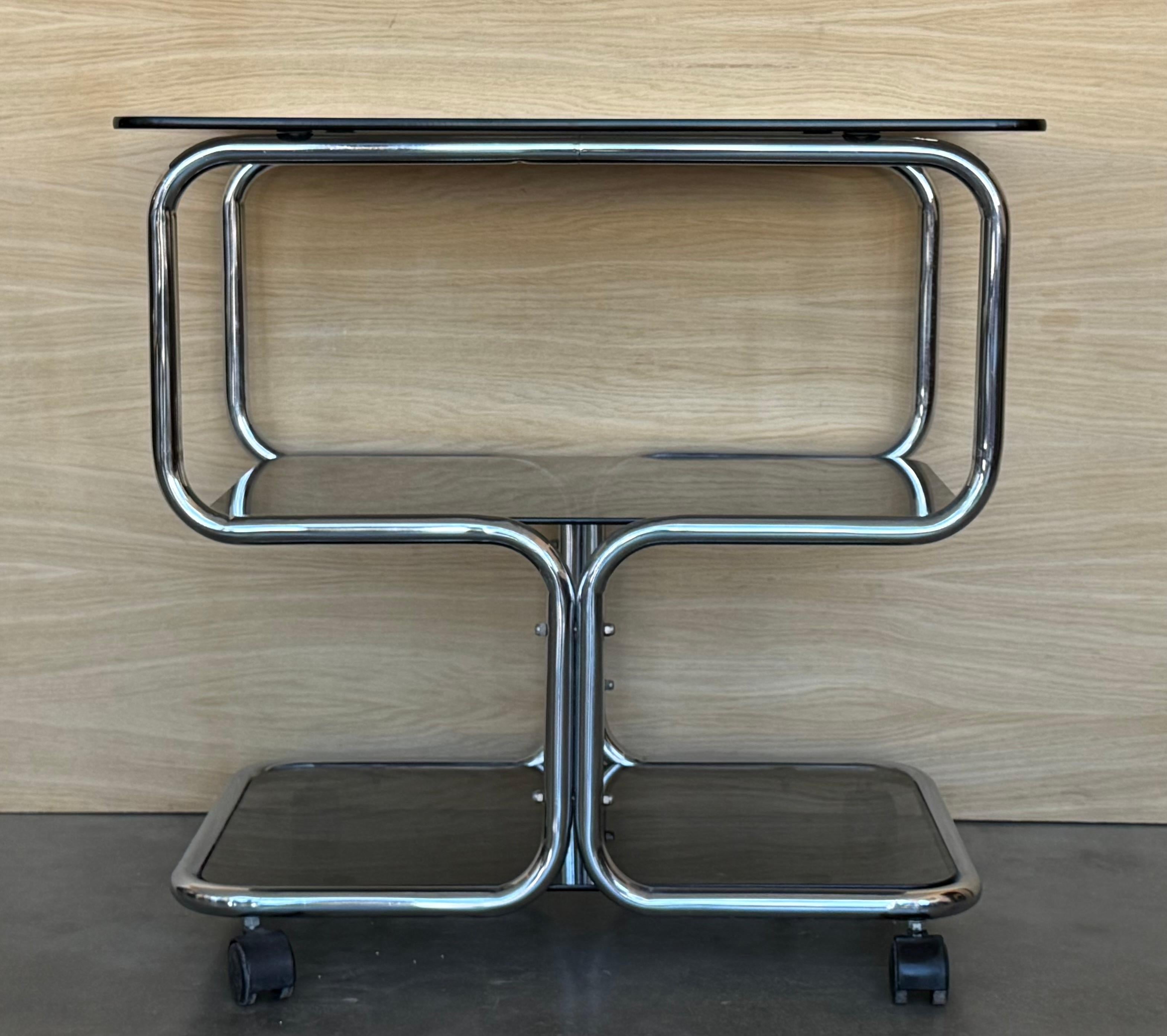 Mid-Century Modern Mid Century Sleek Italian Three Tier Chrome and Glass Drinks Trolley On Castors For Sale