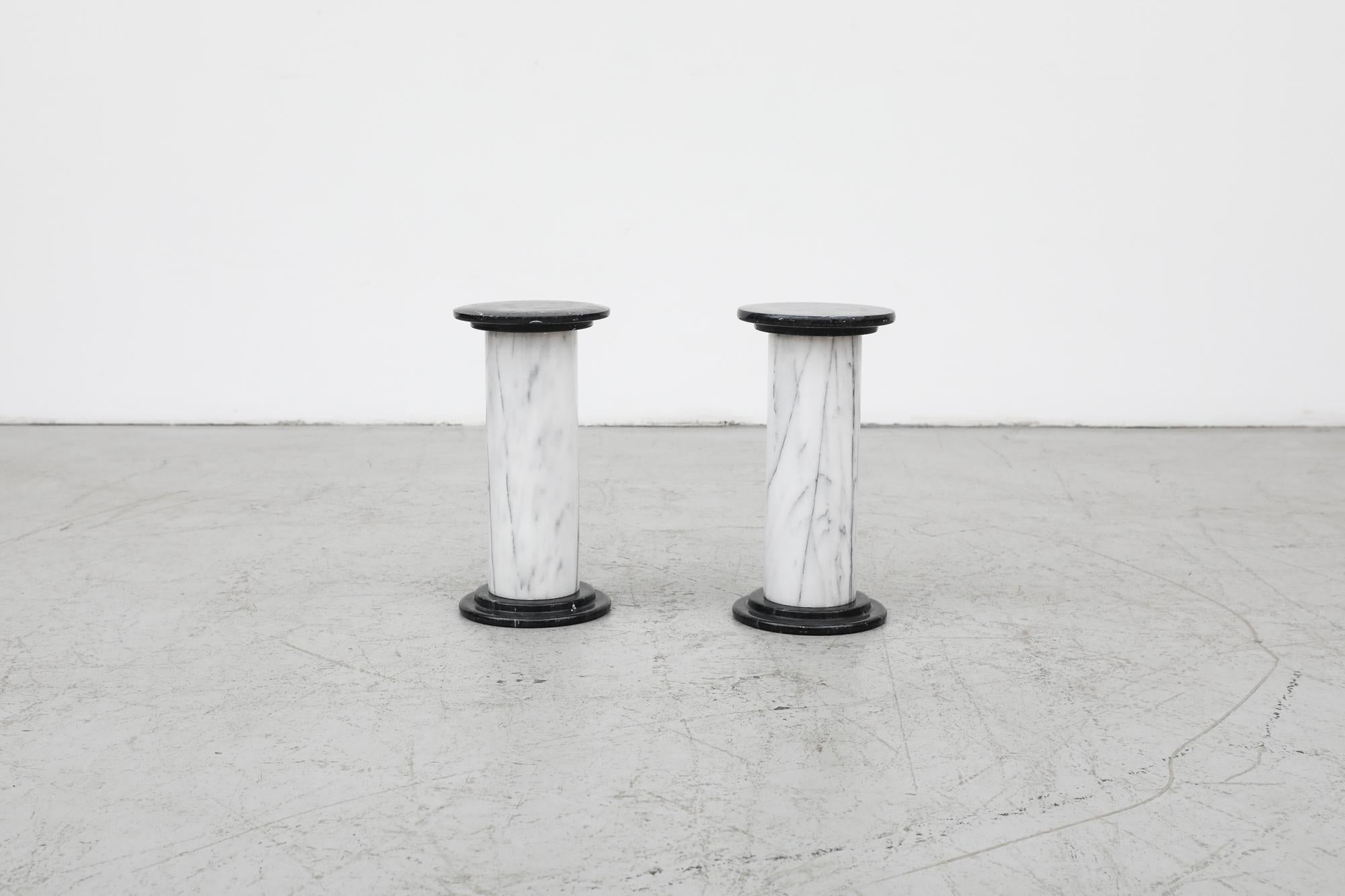 Mid-Century Small Black and White Marble Pillars as Side Tables or Plant Stands In Good Condition For Sale In Los Angeles, CA