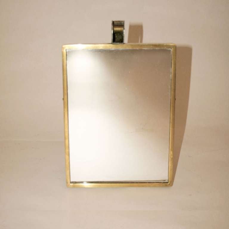 Compact Table Mirror in brass with interesting hinge detail.