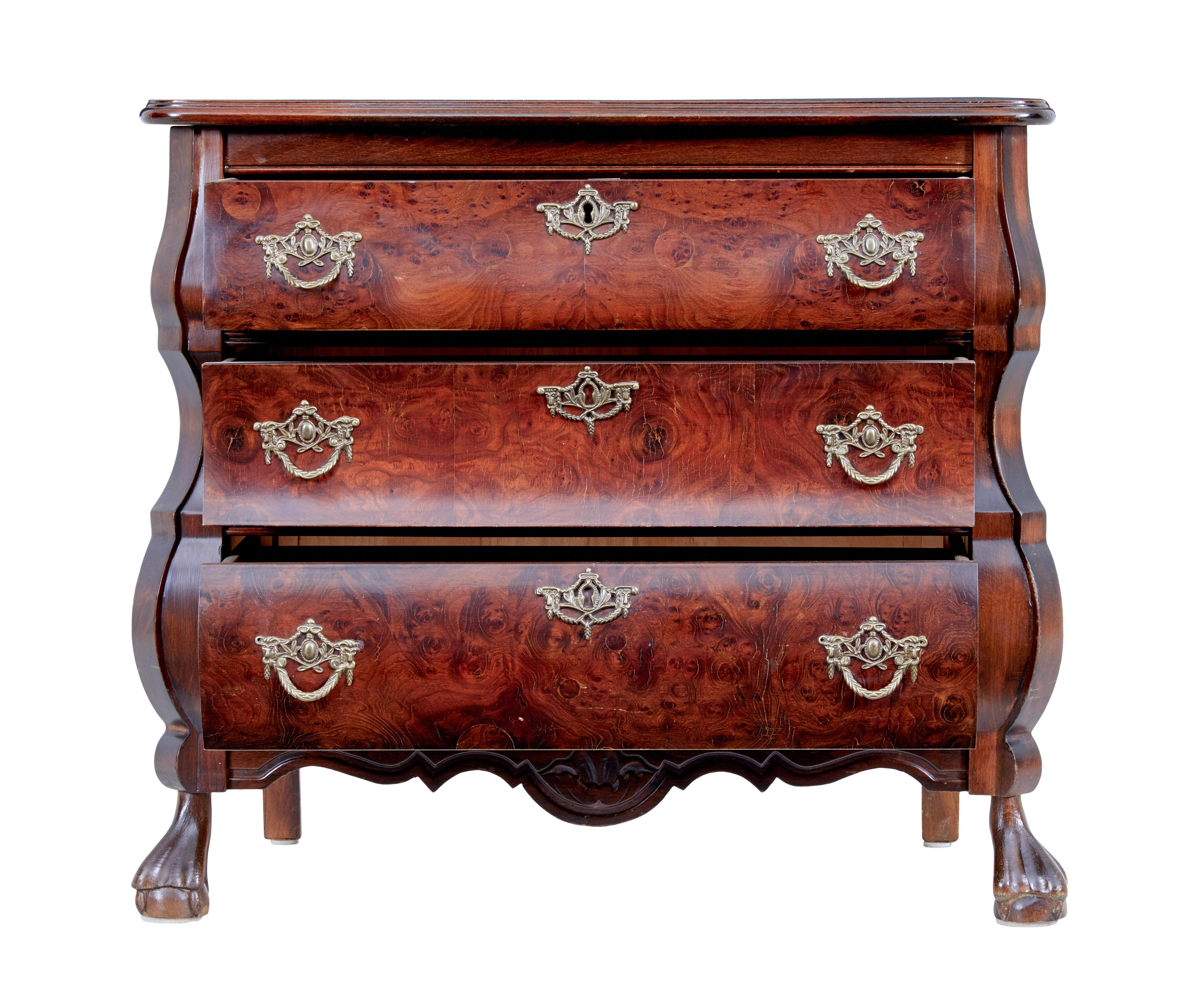 1950's small mulberry bombe shaped commode chest of drawers circa 1960.

Rococo revival chest of small proportions.

Petit scandinavian commode circa 1960. Made in beautiful mulberry veneers. 3 drawers with ornate brass swag handles and escutheons.
