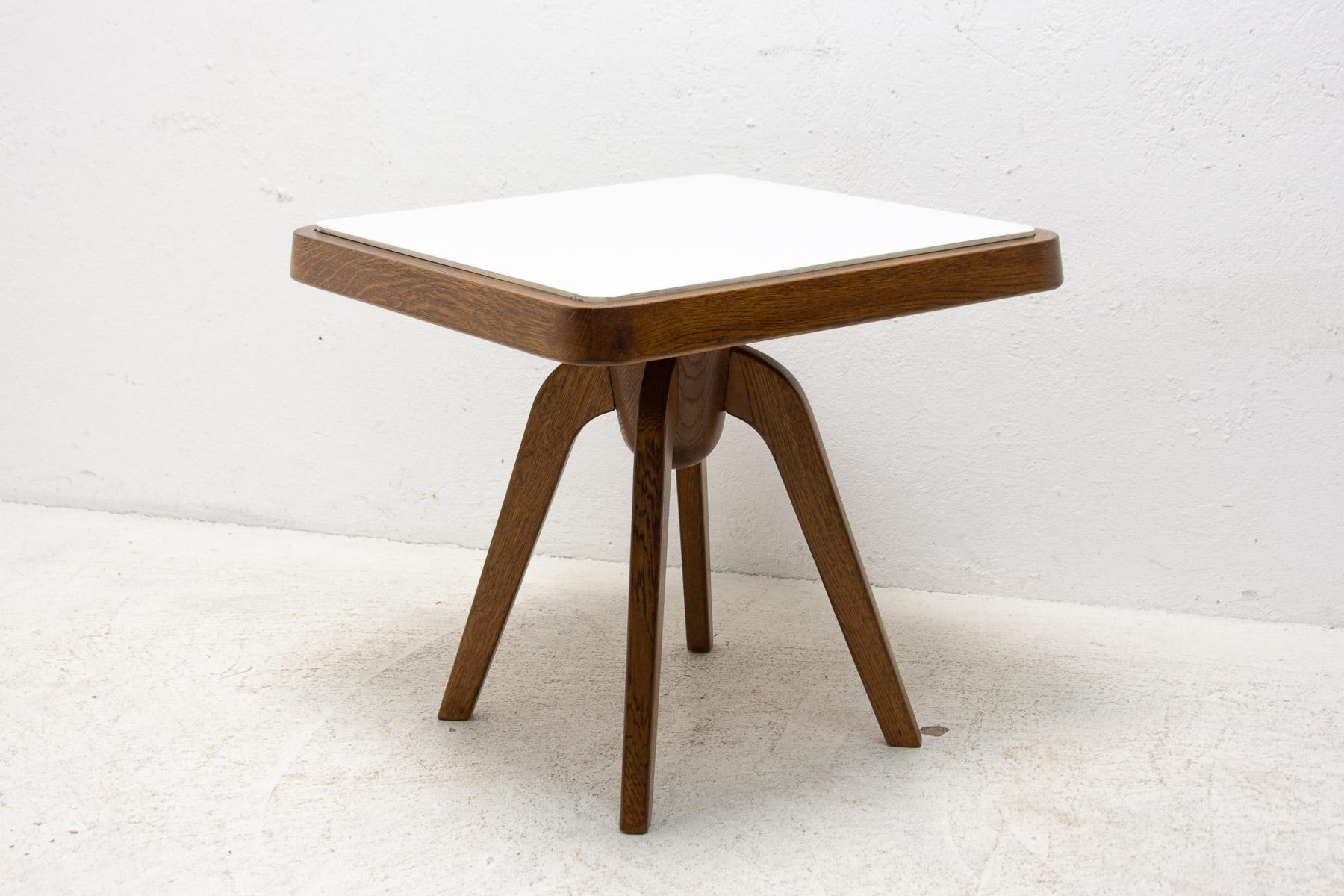 Mid century wooden stool or side table. Materials: milky glass, beechwood. Cool retro piece. In very good Vintage condition, showing slight signs of age and using.

Dimensions: 54 x 51 x 54 cm (WxHxD).
