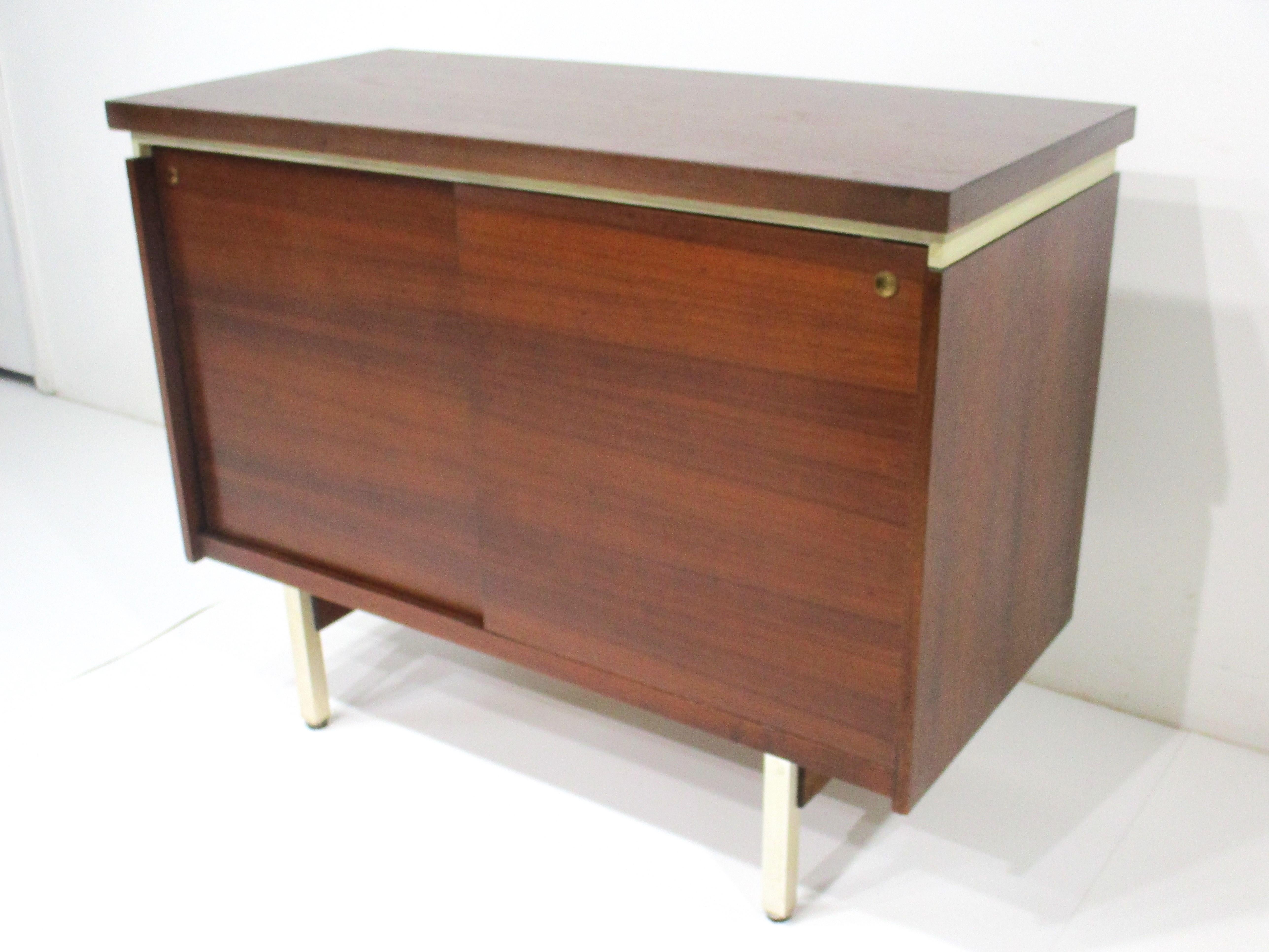 Mid-Century Modern Mid Century Small Walnut Credenza in the style of McCobb Calvin  For Sale