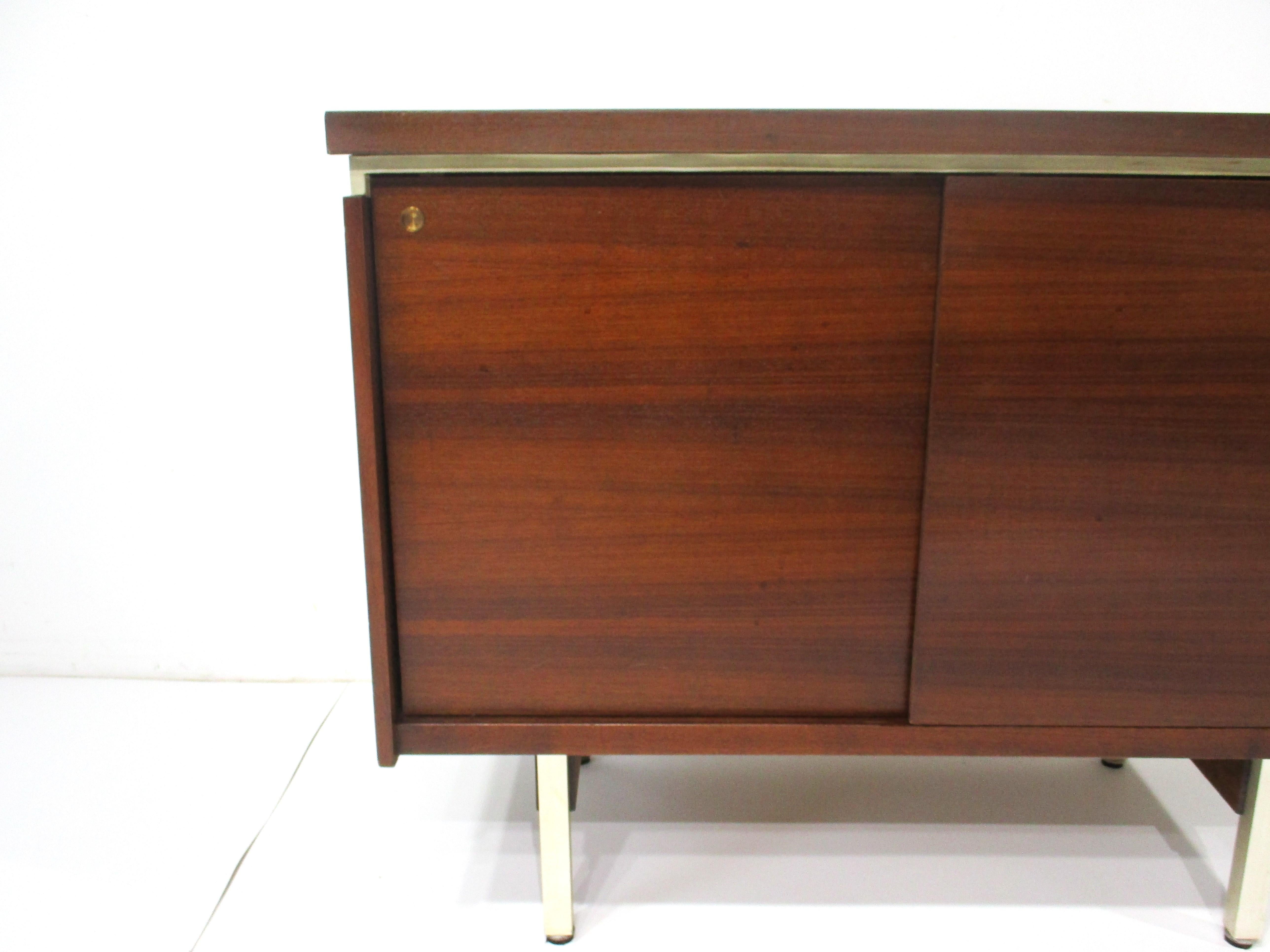American Mid Century Small Walnut Credenza in the style of McCobb Calvin  For Sale