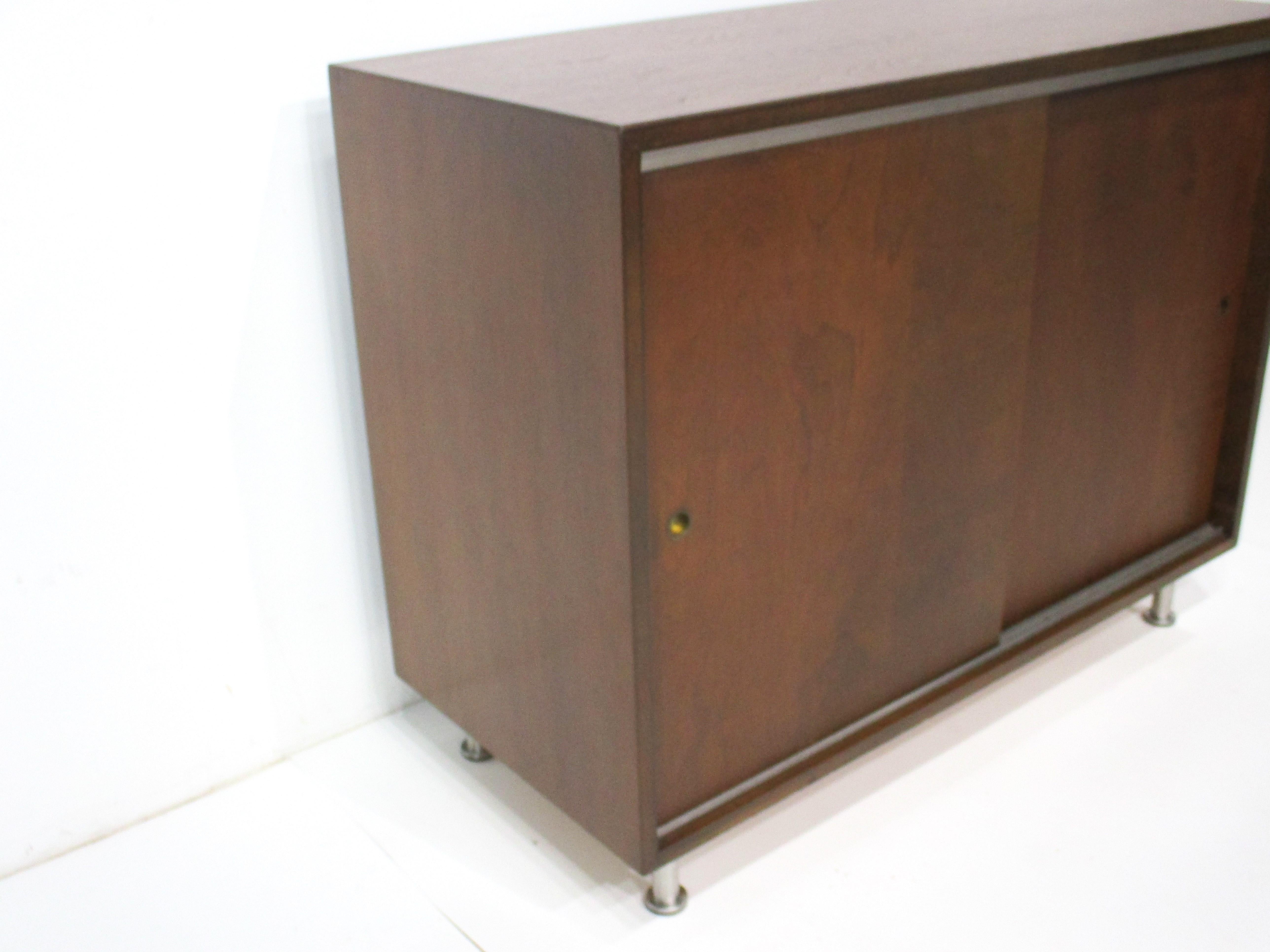 Mid-Century Modern Mid Century Small Walnut Credenza in the style of Risom 