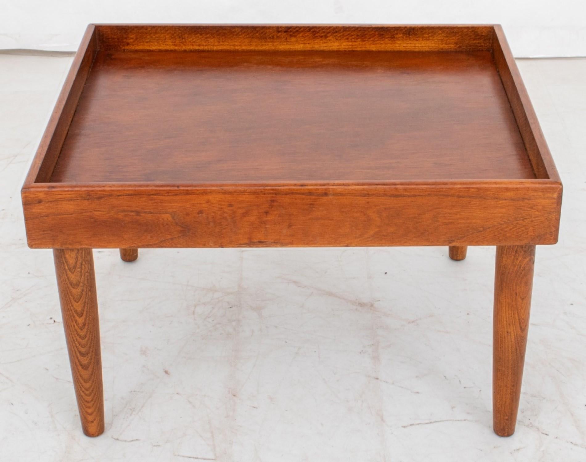 Mid-Century Small Walnut Low Coffee Table

Design: Mid-Century Modern style with four tapered legs.
Dimensions: 13.75