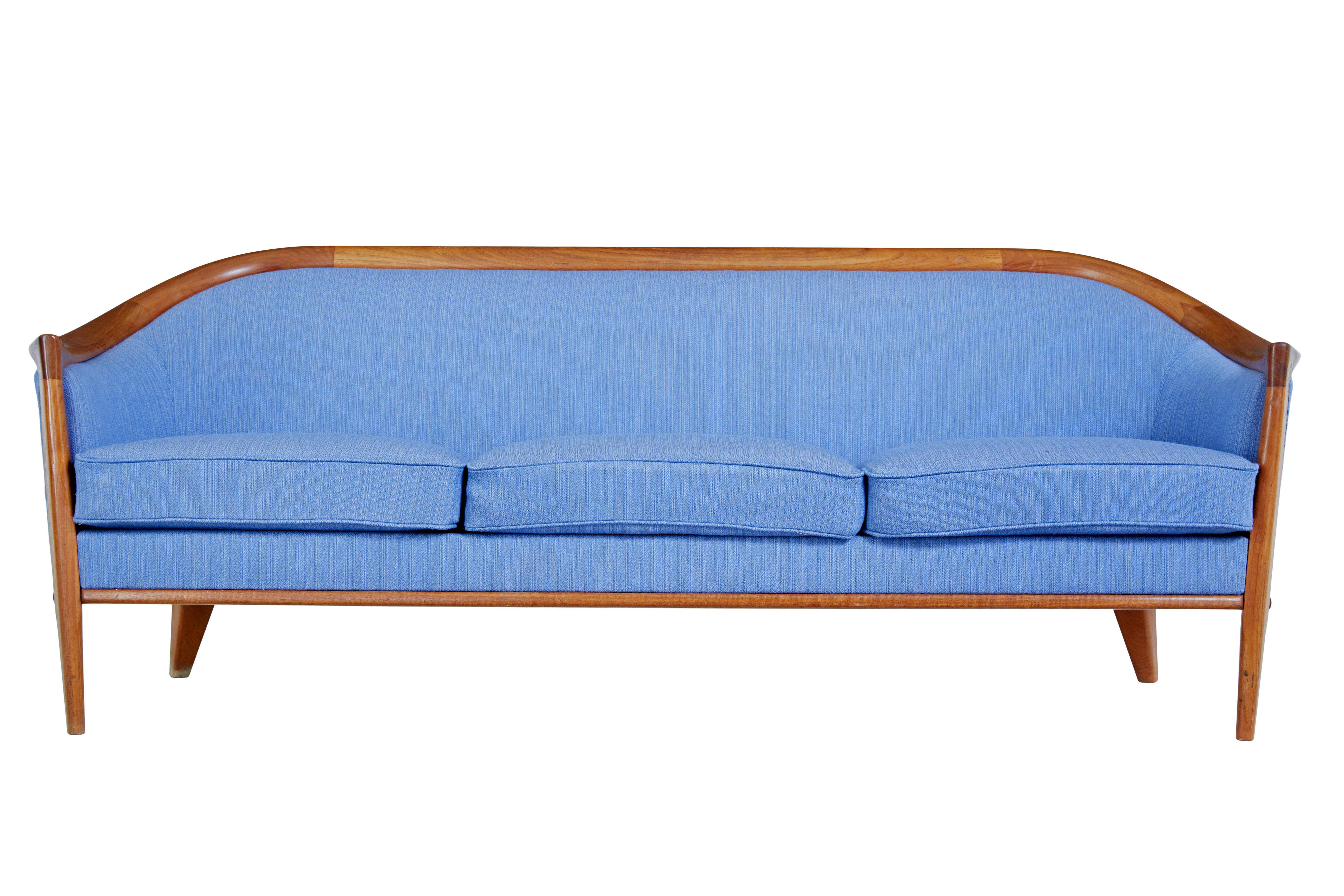 Mid century sofa and armchair by andersson circa 1960.

Here we have a sofa and armchair designed by bertil frighagen for broderna andersson.  Know as the aristocrat model and well recognised for its horseshoe shaped backs.

Made with teak frames,