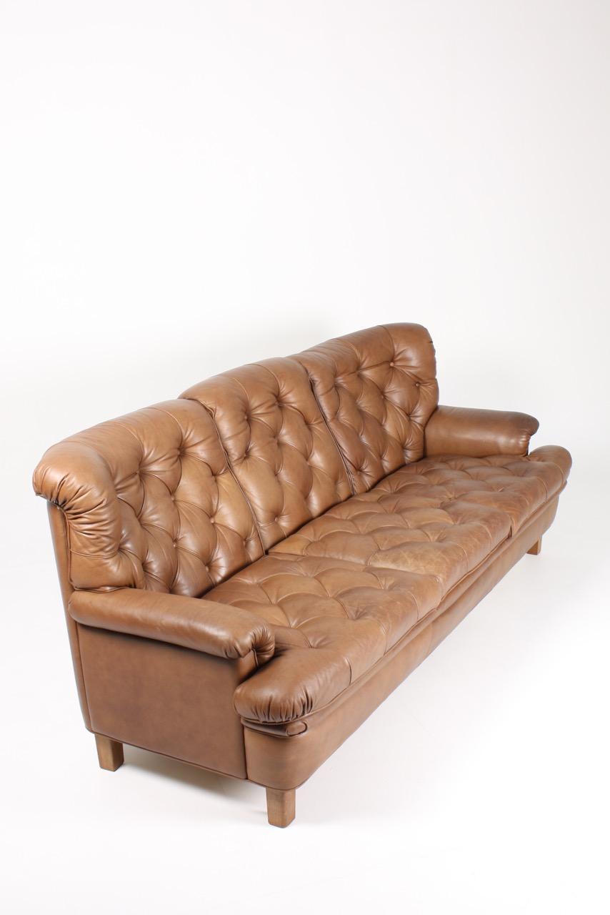 Midcentury Sofa in Patinated Leather by Arne Norell, Made in Sweden, 1960s 2