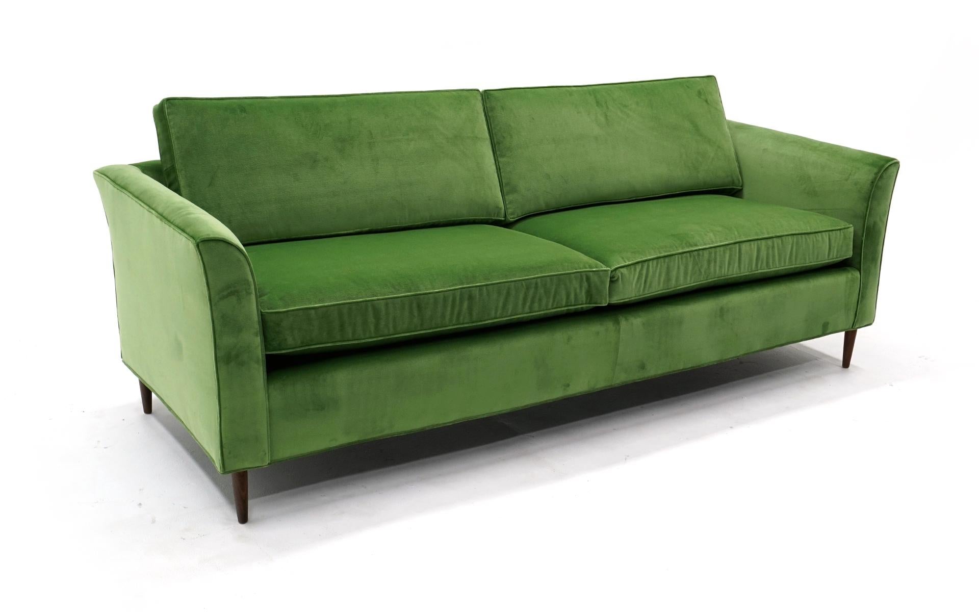 1960s three seat sofa expertly restored and reupholstered in lime green velvet. No wear at all. Comfortable and ready to use.