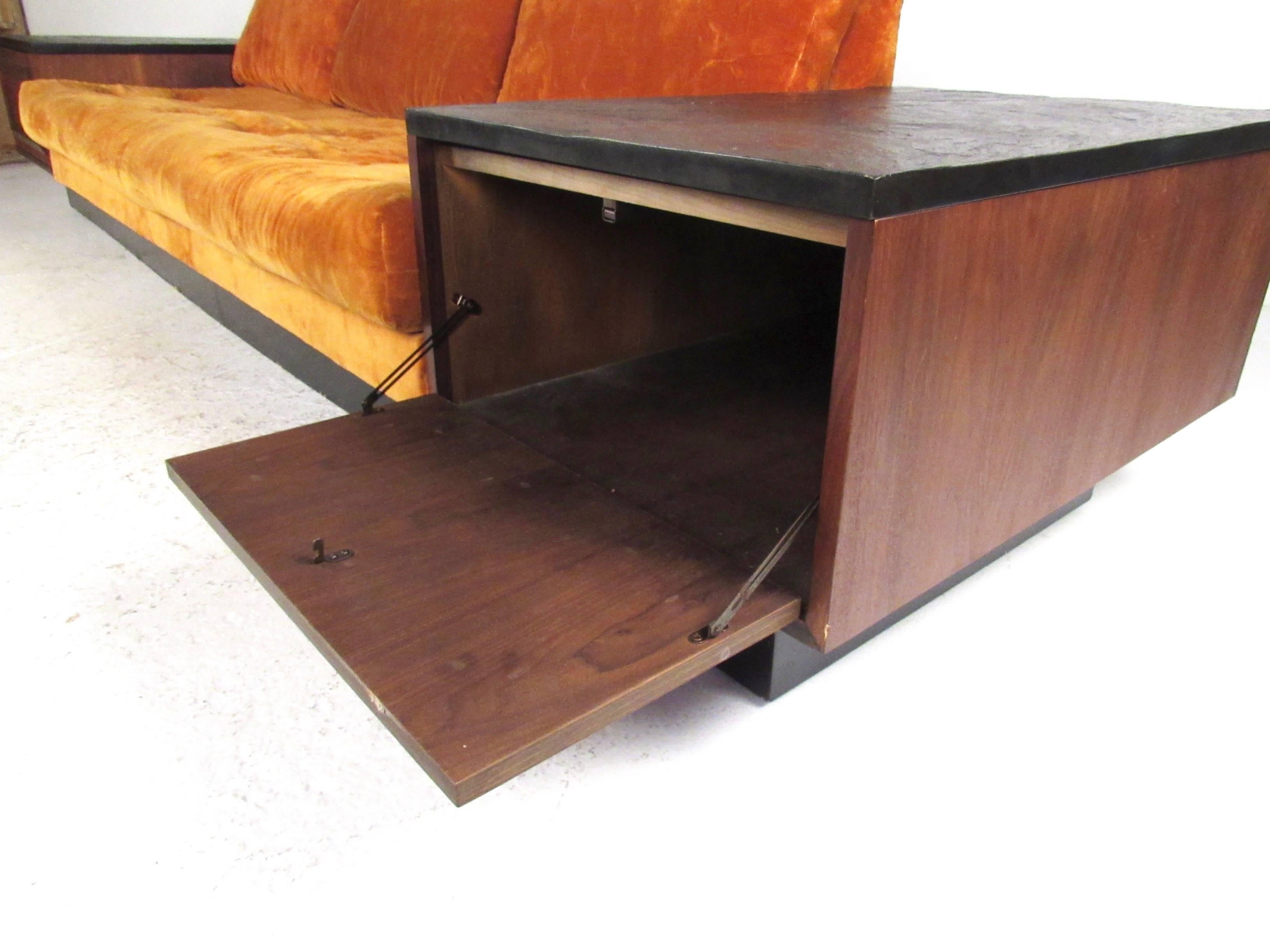 mid century sofa with built in end tables