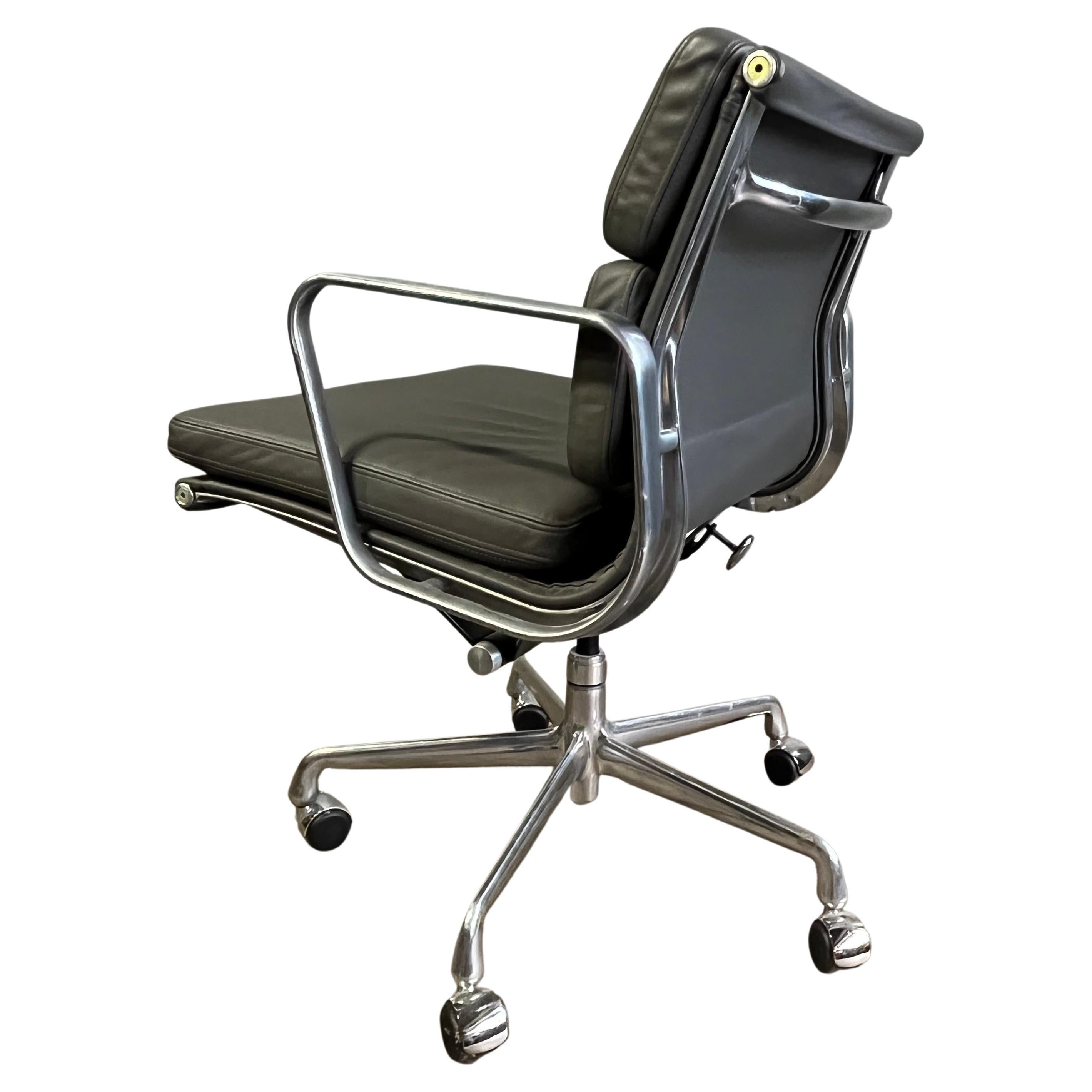 For your consideration is this authentic Eames for Herman Miller vintage soft pad chair in gray leather. Adjustable tilt and height with manual lift. This authentic examples are icons of Mid-Century Modern design. This chair is part of the Eames