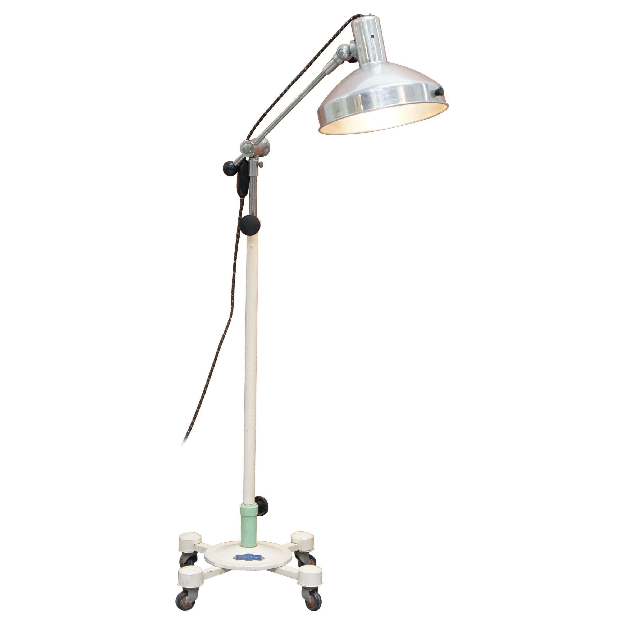 Midcentury Sol-Tan Industrial Articulated Floor Lamp and Original Heating Bulb For Sale